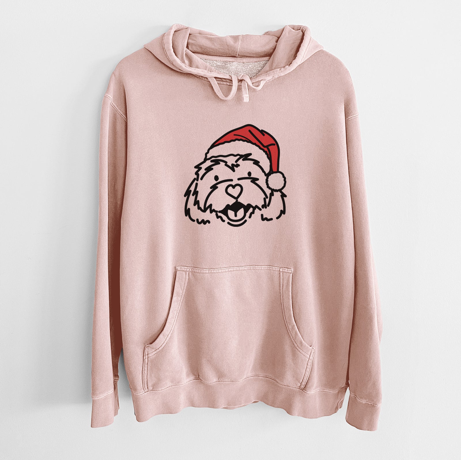 Minimalist line drawing of Harry the Cavachon wearing a Santa hat on a Dusty Pink Unisex pigment dyed hoodie