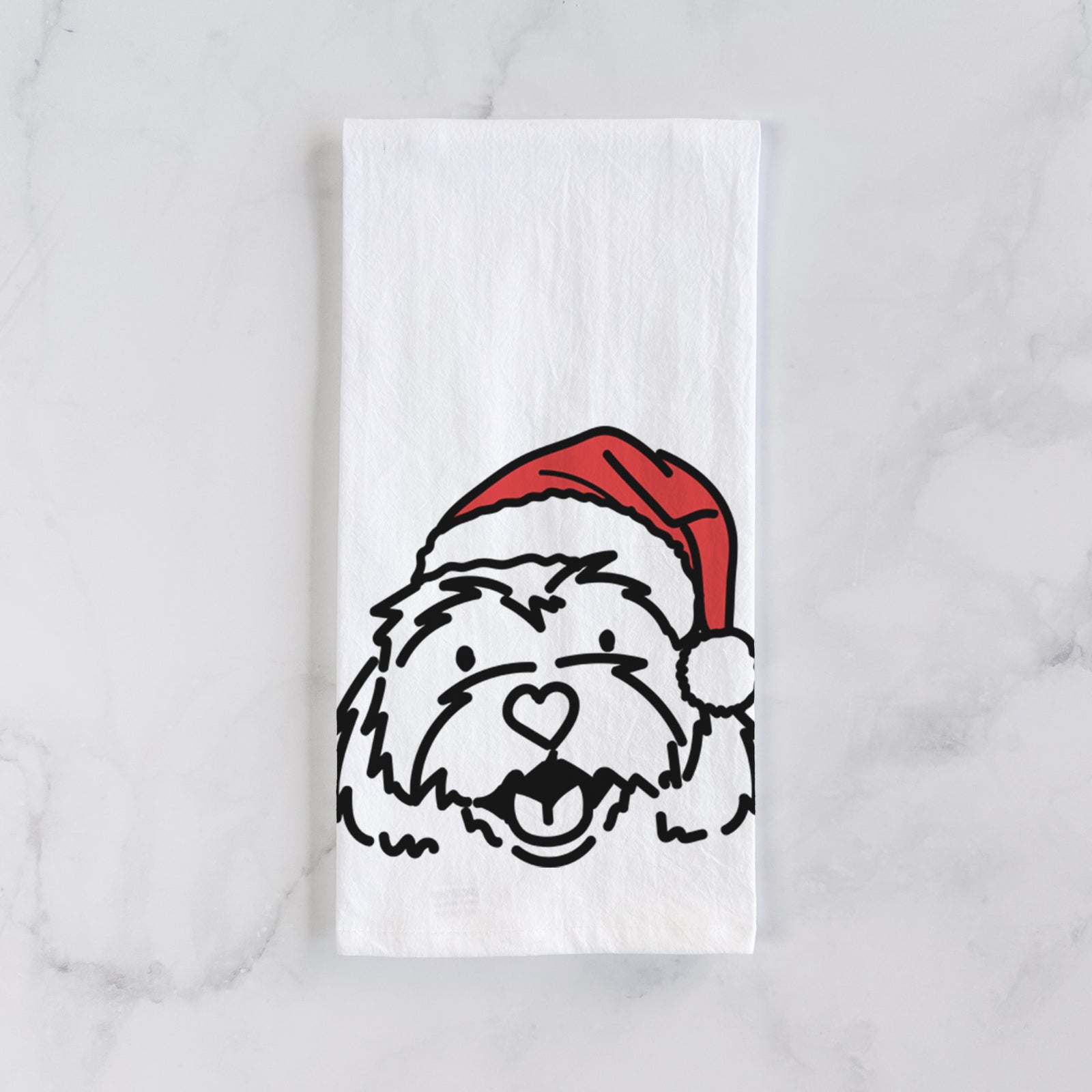 Minimalist line drawing of Harry the Cavachon wearing a Santa hat on a tea towel