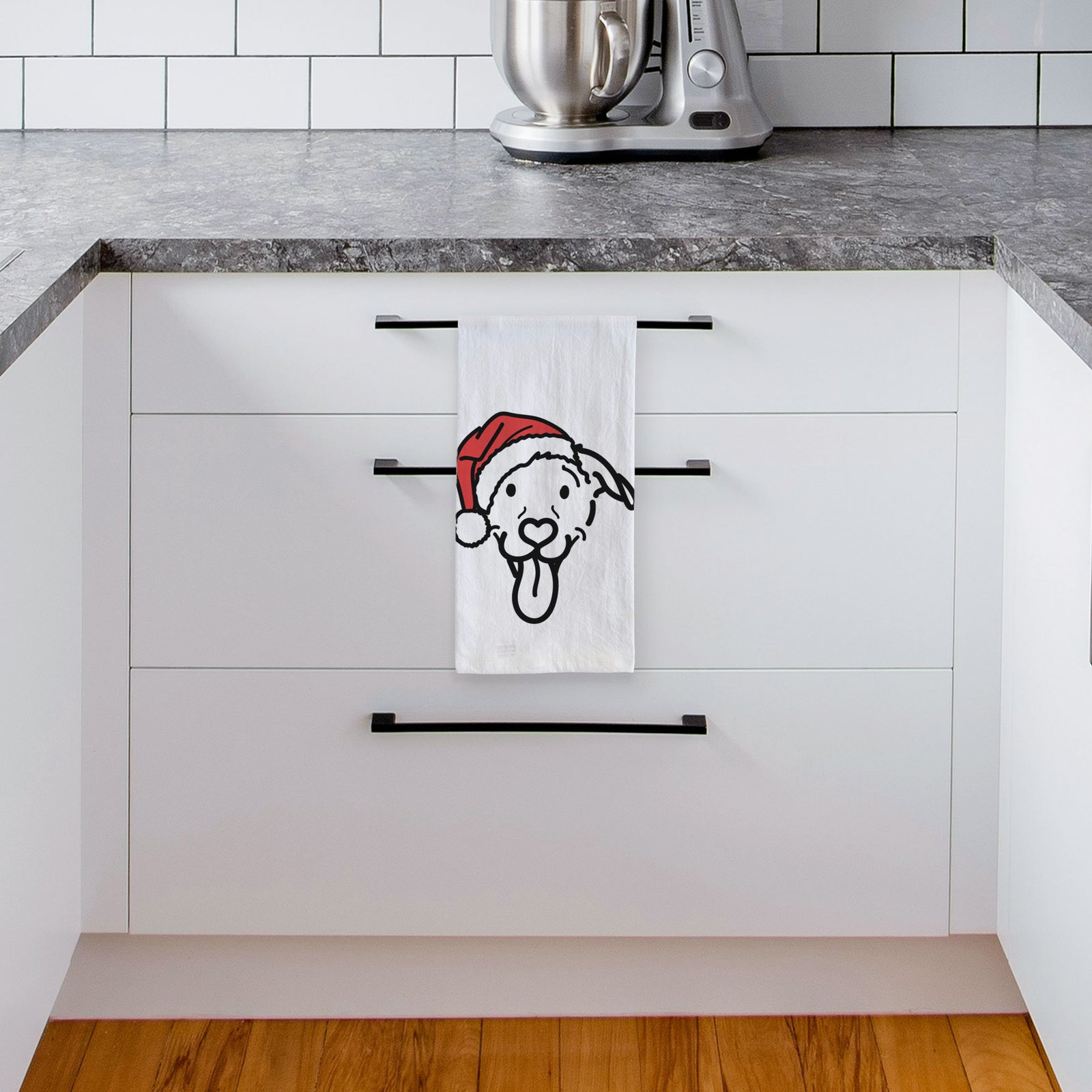 Minimalist line drawing of Hemi the Pitbull Mix wearing a Santa hat on a tea towel, hanging on an oven door in a kitchen