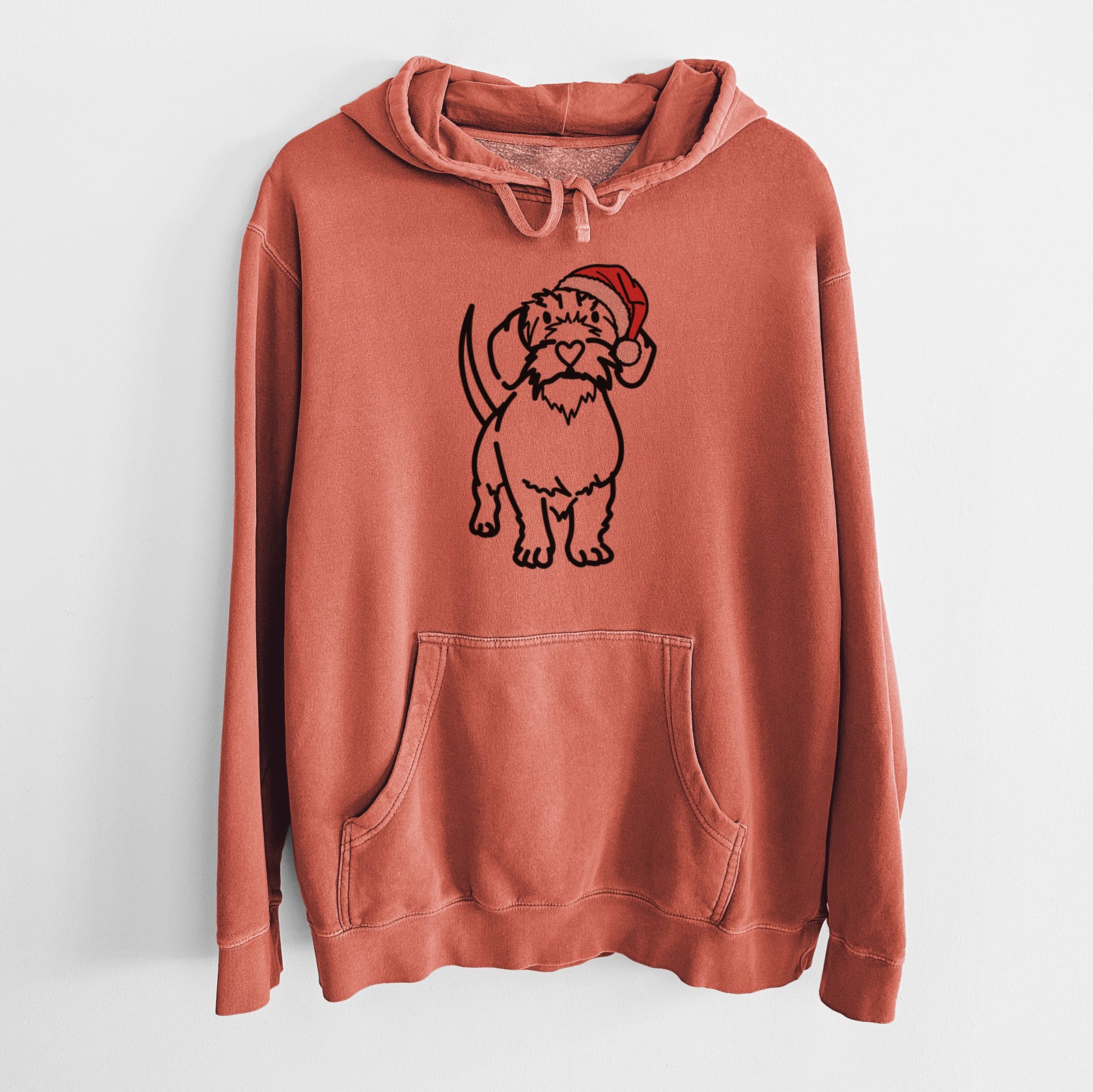 Minimalist line drawing of Henry the Wire Dachshund wearing a Santa hat on an Amber Unisex pigment dyed hoodie