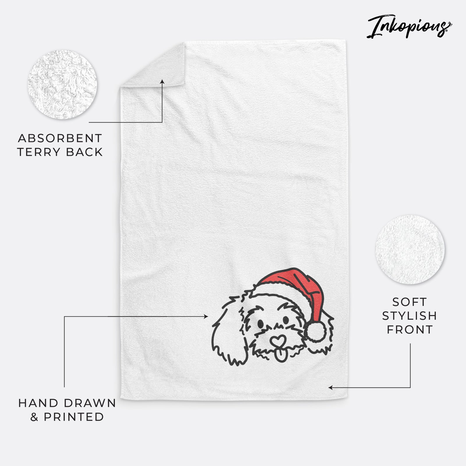 Minimalist line drawing of Holly the Maltipoo wearing a Santa hat on a decorative hand towel