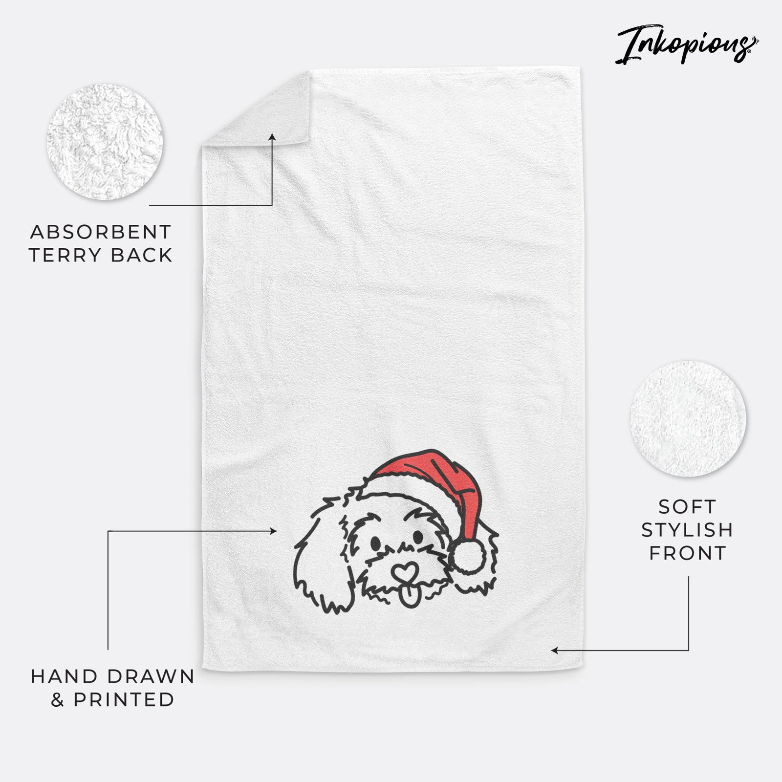 Minimalist line drawing of Holly the Maltipoo wearing a Santa hat on a decorative hand towel
