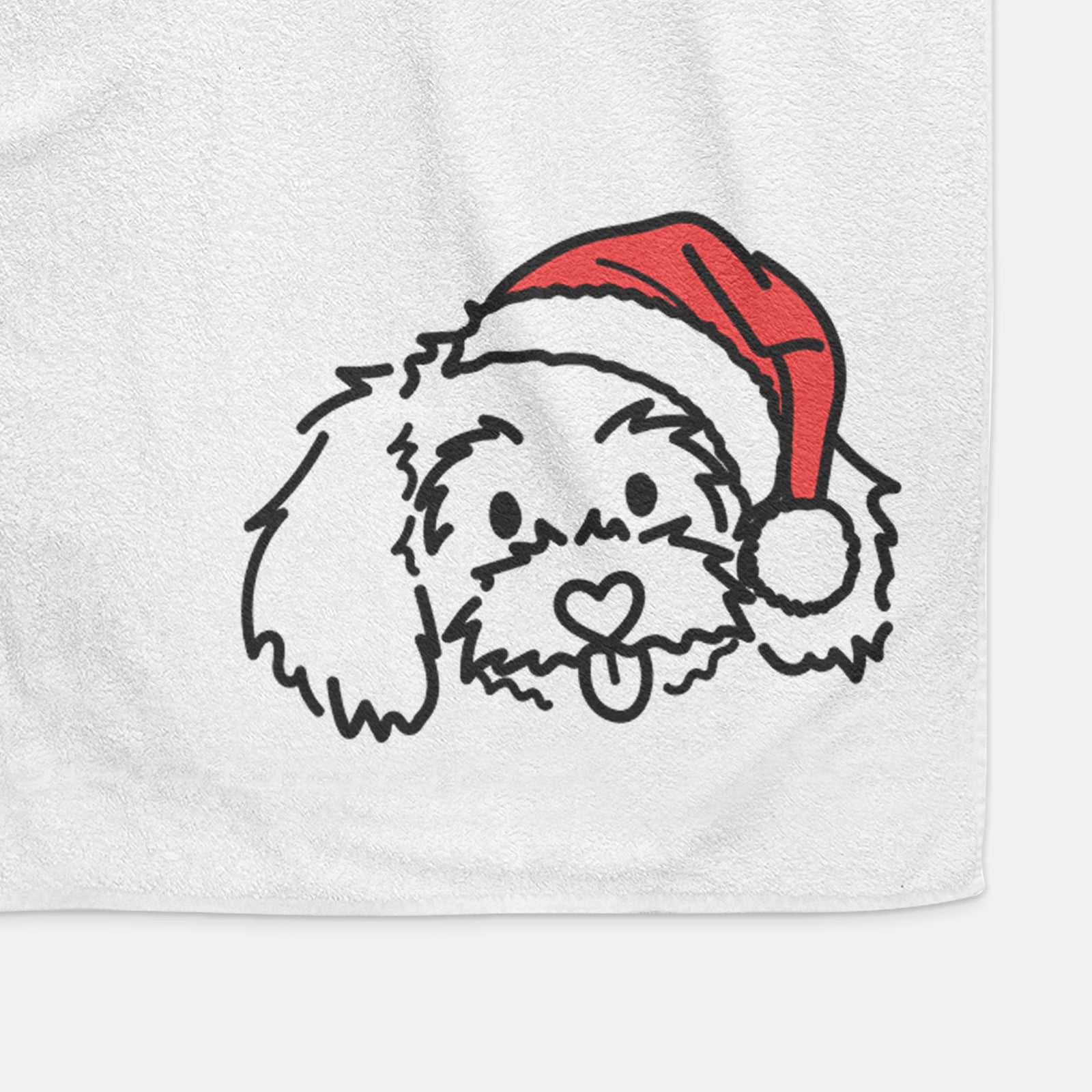 Minimalist line drawing of Holly the Maltipoo wearing a Santa hat on a decorative hand towel