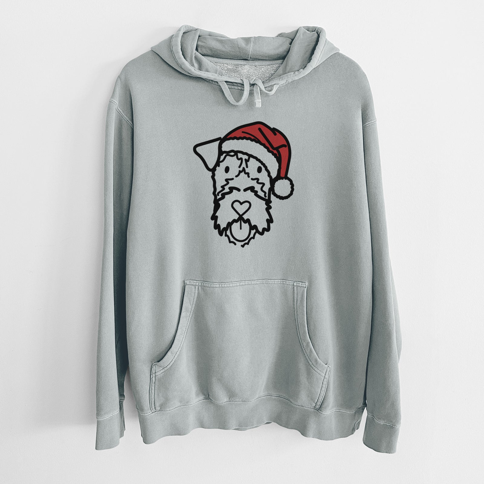 Minimalist line drawing of an Irish Terrier wearing a Santa hat on a Sage Unisex pigment dyed hoodie