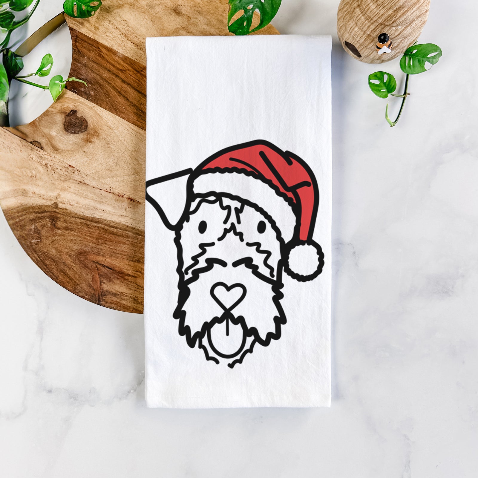 Minimalist line drawing of an Irish Terrier wearing a Santa hat on a tea towel