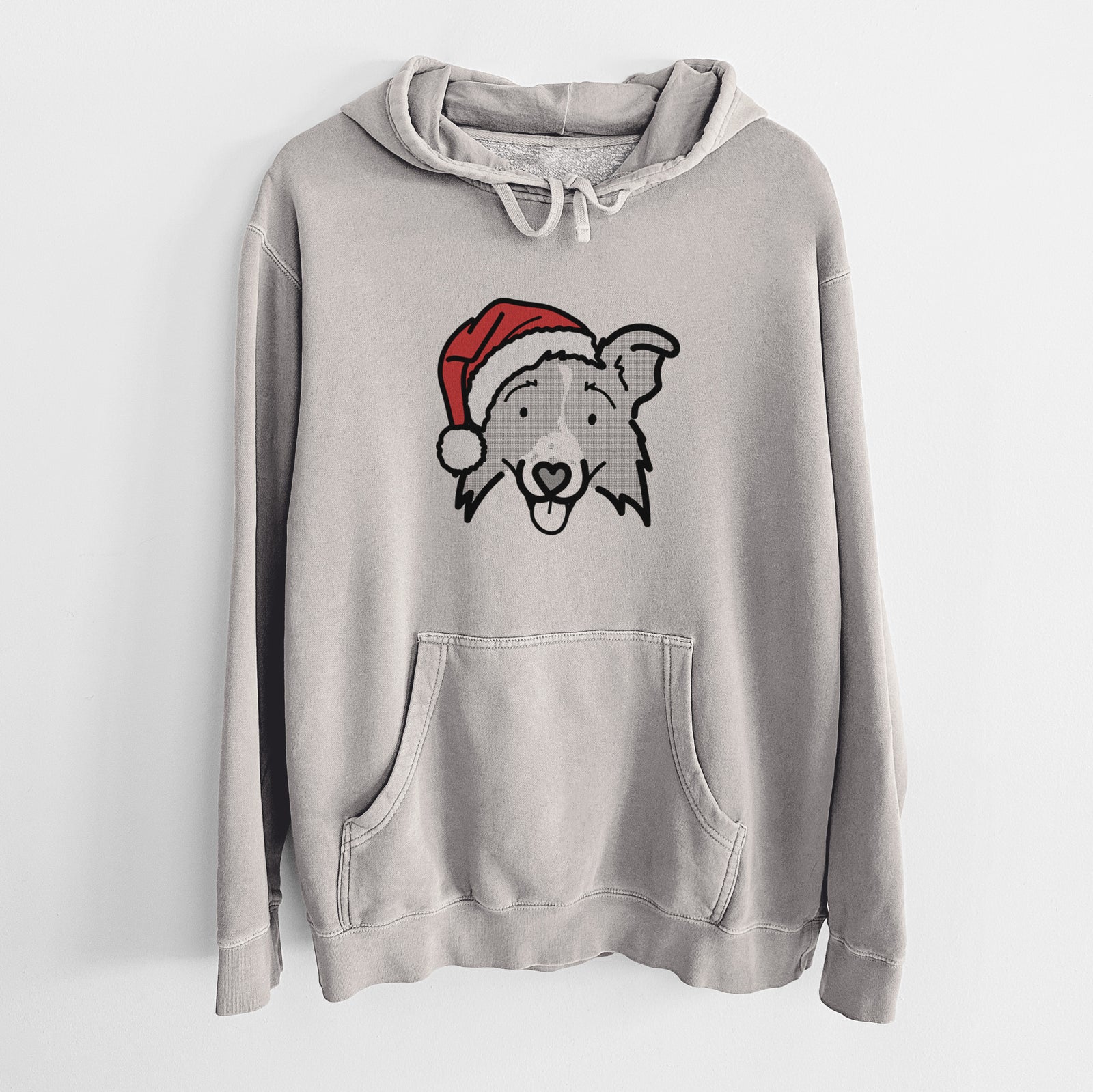 Minimalist line drawing of Jam the Border Collie 2.0 wearing a Santa hat on a Cement Unisex pigment dyed hoodie