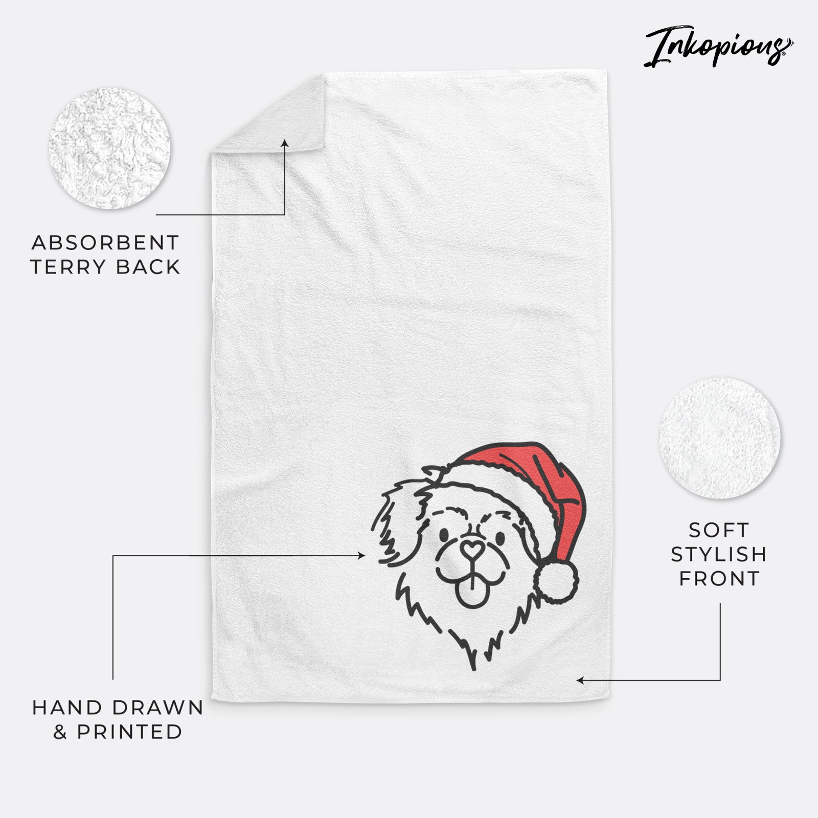 Minimalist line drawing of Jiji the Tibetan Spaniel wearing a Santa hat on a decorative hand towel