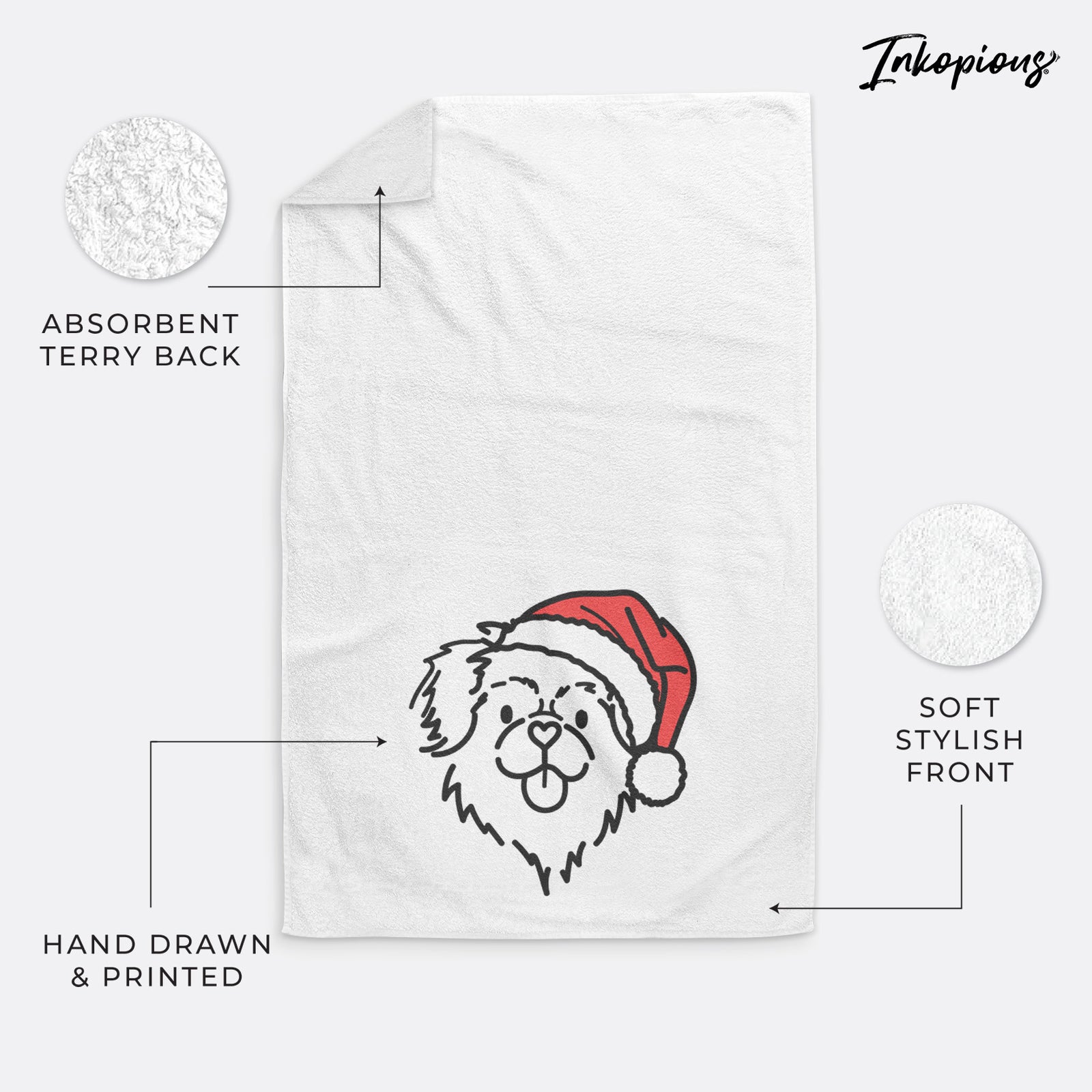 Minimalist line drawing of Jiji the Tibetan Spaniel wearing a Santa hat on a decorative hand towel