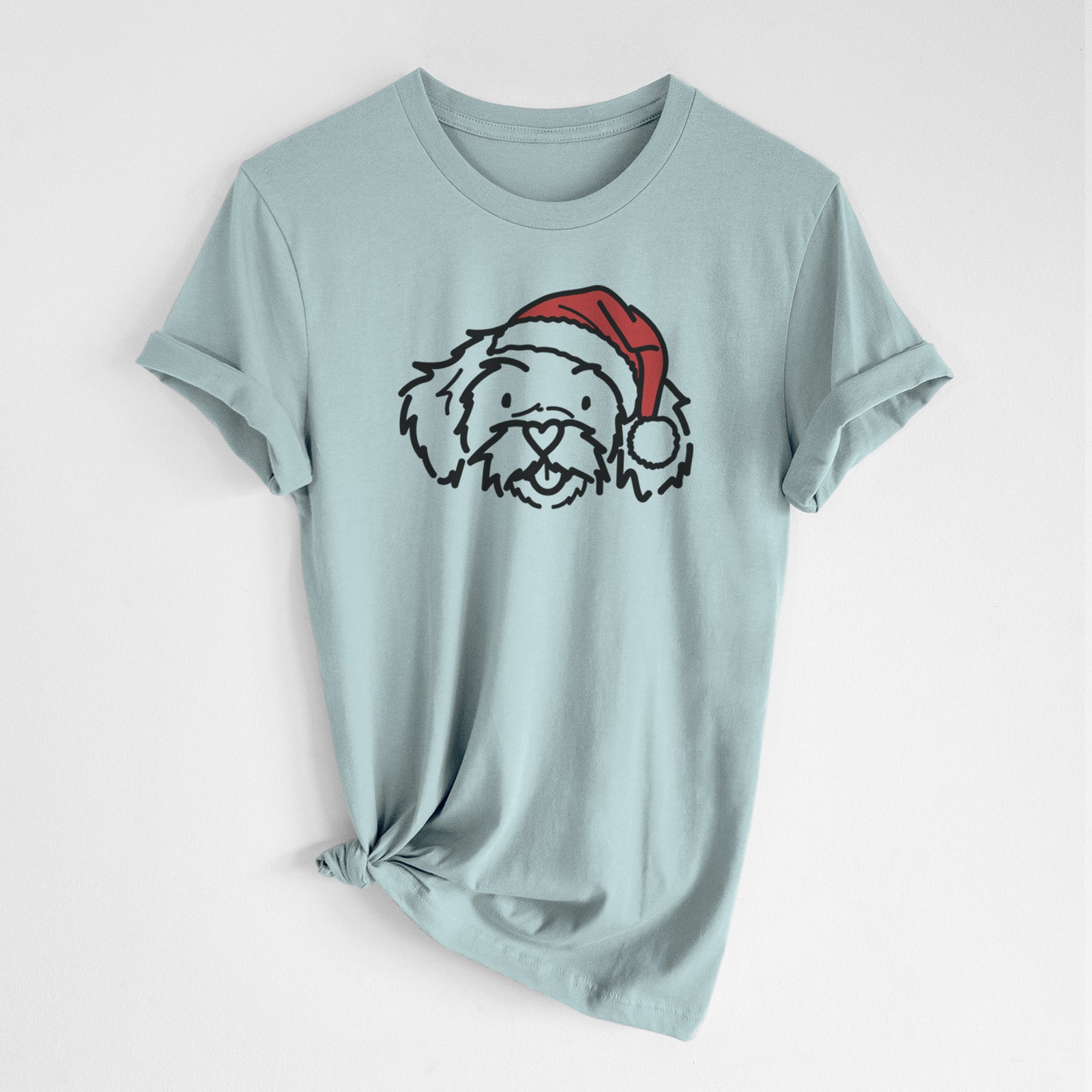 Minimalist line drawing of Jo Jo the Peekapoo wearing a Santa hat on a Dusty Blue Unisex crewneck, worn by a woman