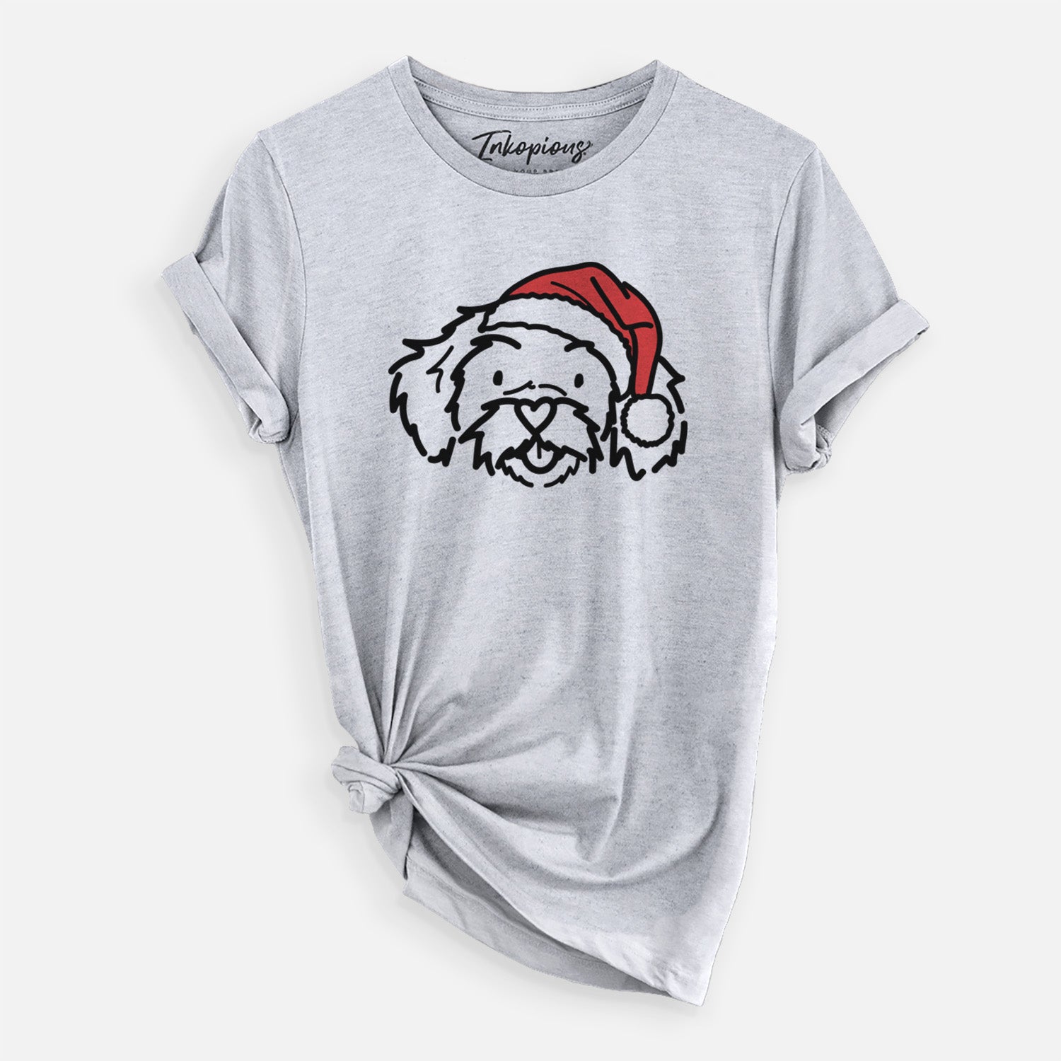 Minimalist line drawing of Jo Jo the Peekapoo wearing a Santa hat on a Grey Unisex crewneck, worn by a woman