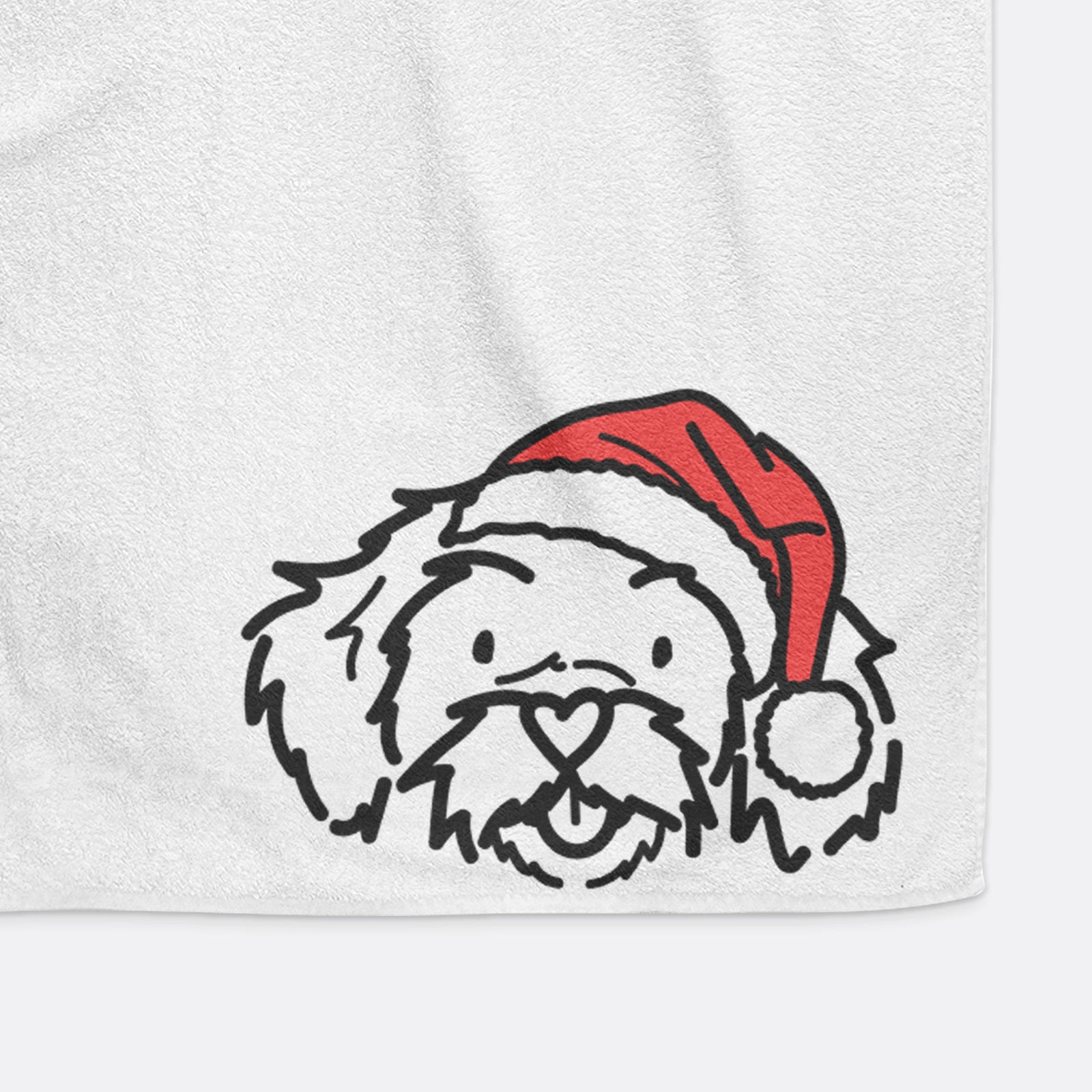 Minimalist line drawing of Jo Jo the Peekapoo wearing a Santa hat on a hand towel