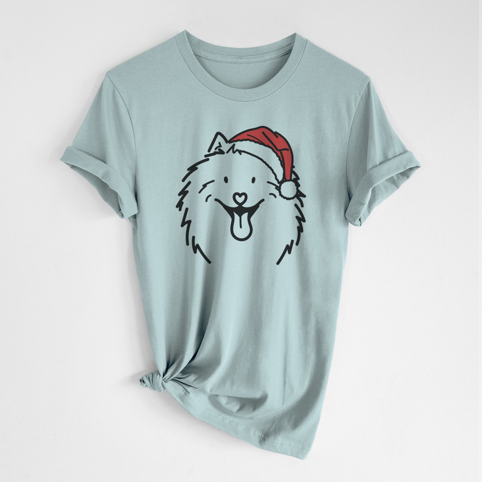 Minimalist line drawing of Johnny the Samoyed wearing a Santa hat on a Dusty Blue Unisex crewneck, worn by a woman