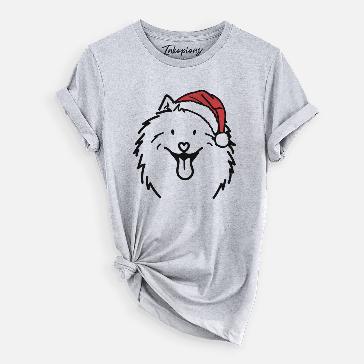 Minimalist line drawing of Johnny the Samoyed wearing a Santa hat on a Grey Unisex crewneck, worn by a woman