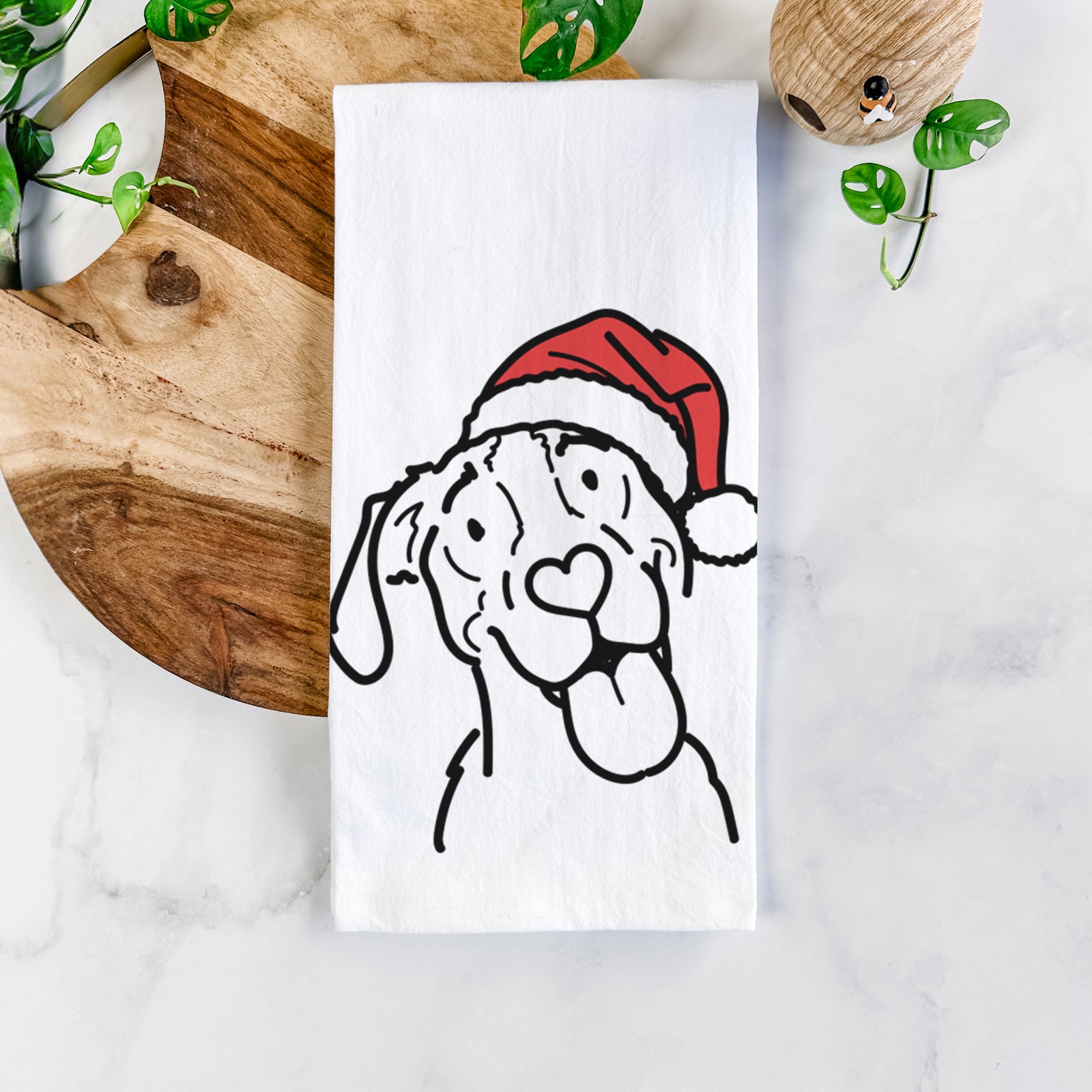 Minimalist line drawing of Kimble the Treeing Walker Coonhound wearing a Santa hat on a tea towel