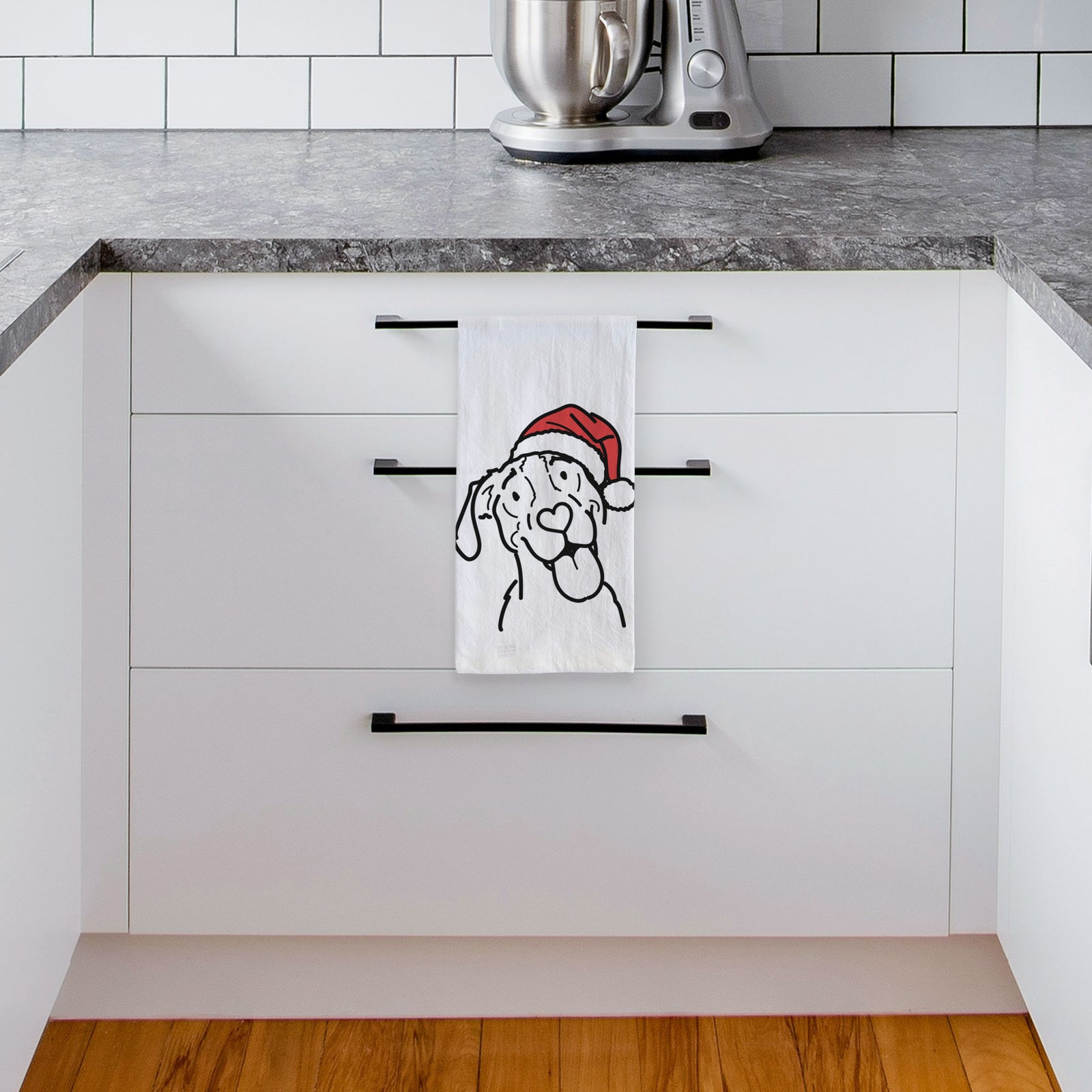 Minimalist line drawing of Kimble the Treeing Walker Coonhound wearing a Santa hat on a tea towel, hanging on an oven door in a kitchen