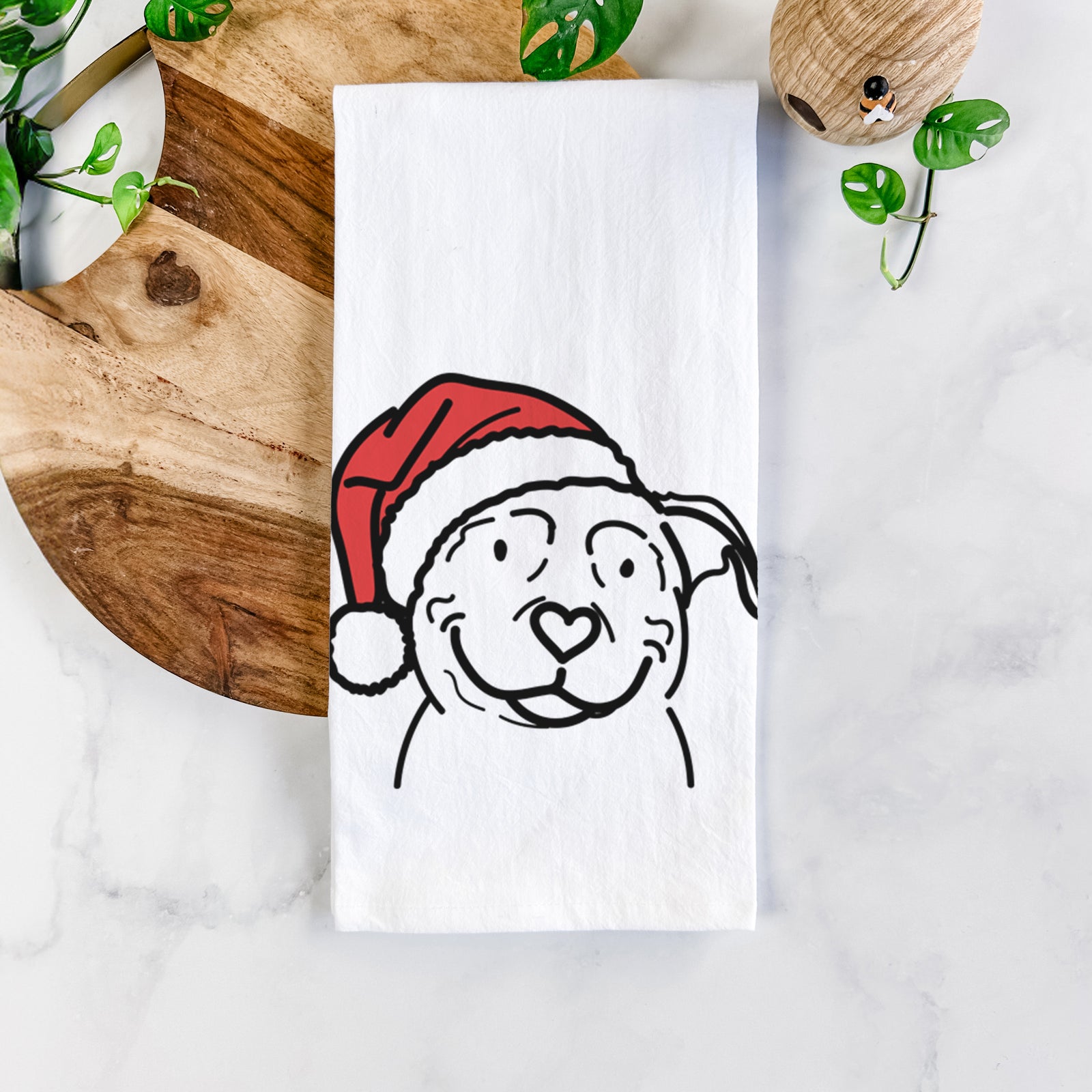 Minimalist line drawing of Lady the American Pitbull Terrier wearing a Santa hat on a tea towel