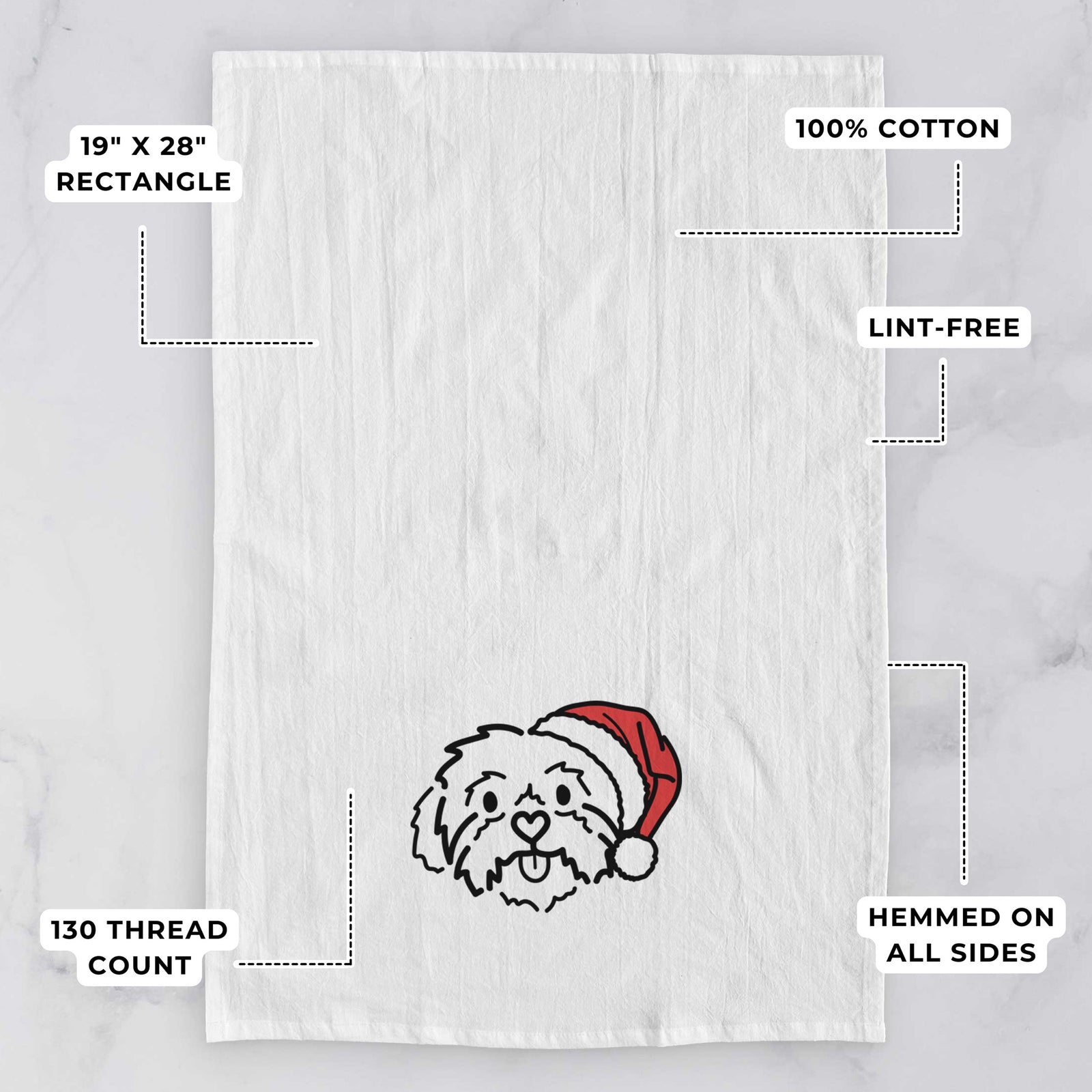 Minimalist line drawing of Leo the Shih Tzu wearing a Santa hat on a tea towel, with feature callouts: 19 x 28 inch rectangle, 100% cotton, lint-free, 120 thread count, hemmed on all sides