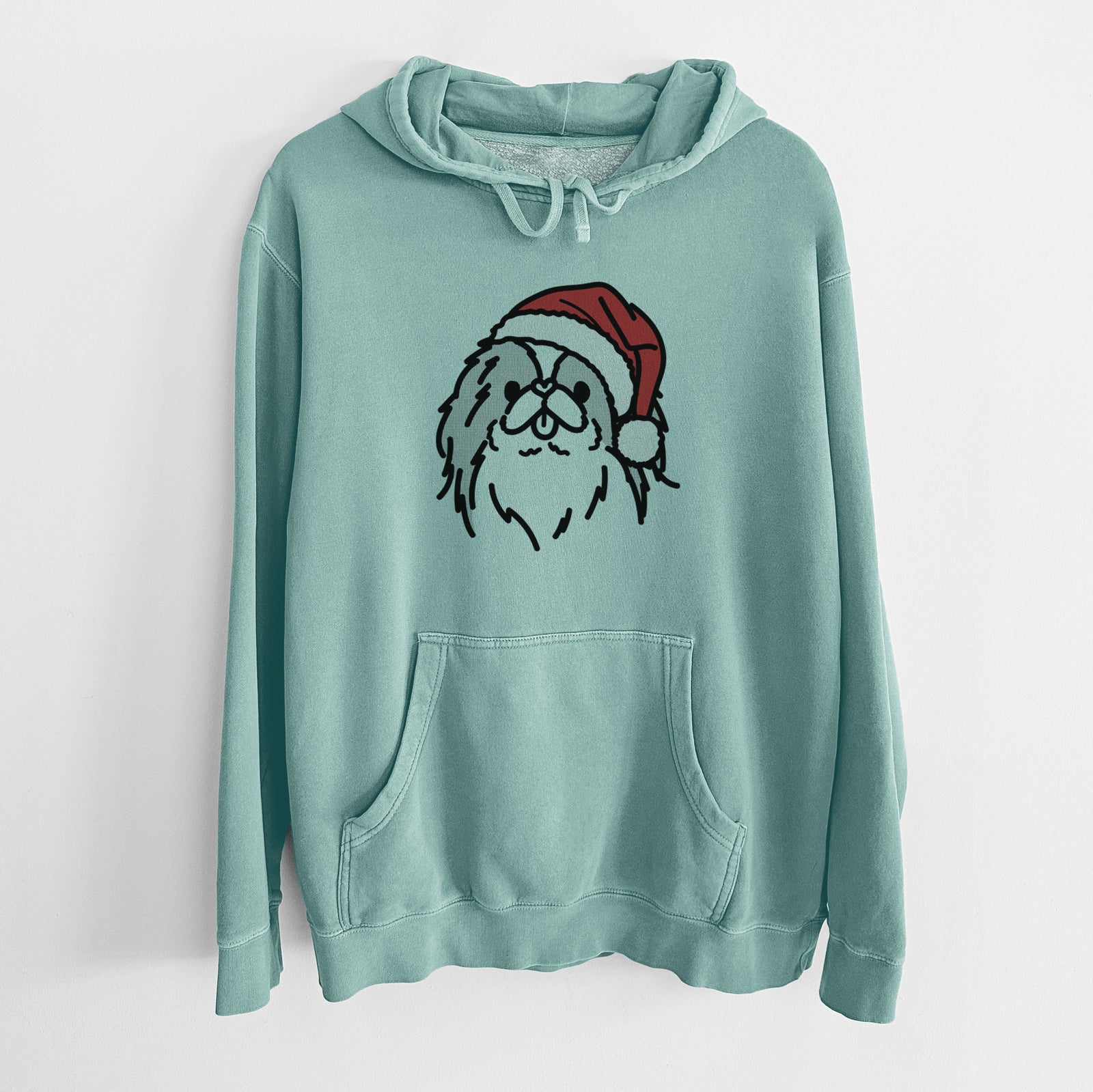 Minimalist line drawing of Macha the Japanese Chin wearing a Santa hat on a Mint Unisex pigment dyed hoodie