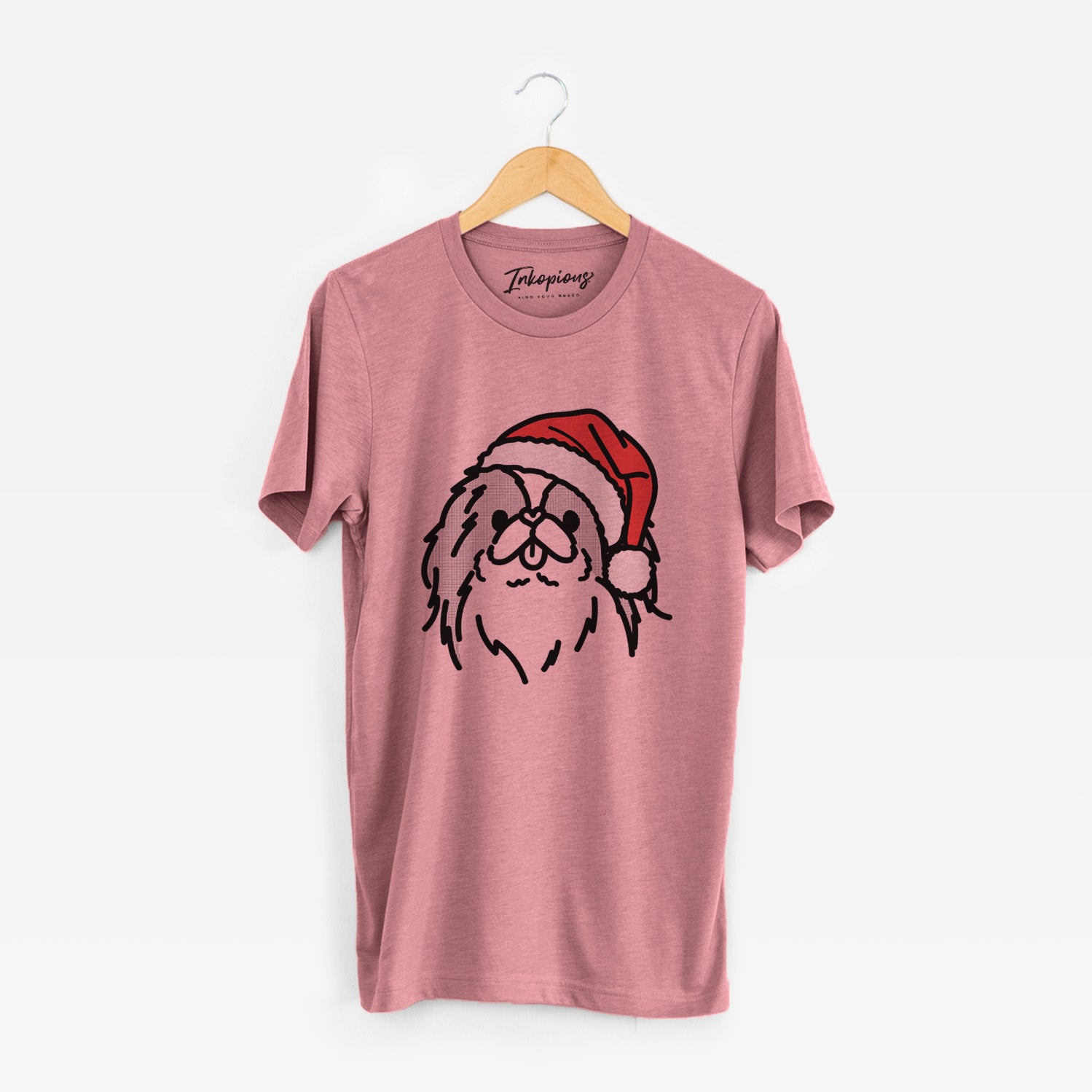 Minimalist line drawing of Macha the Japanese Chin wearing a Santa hat on a Mauve Unisex crewneck