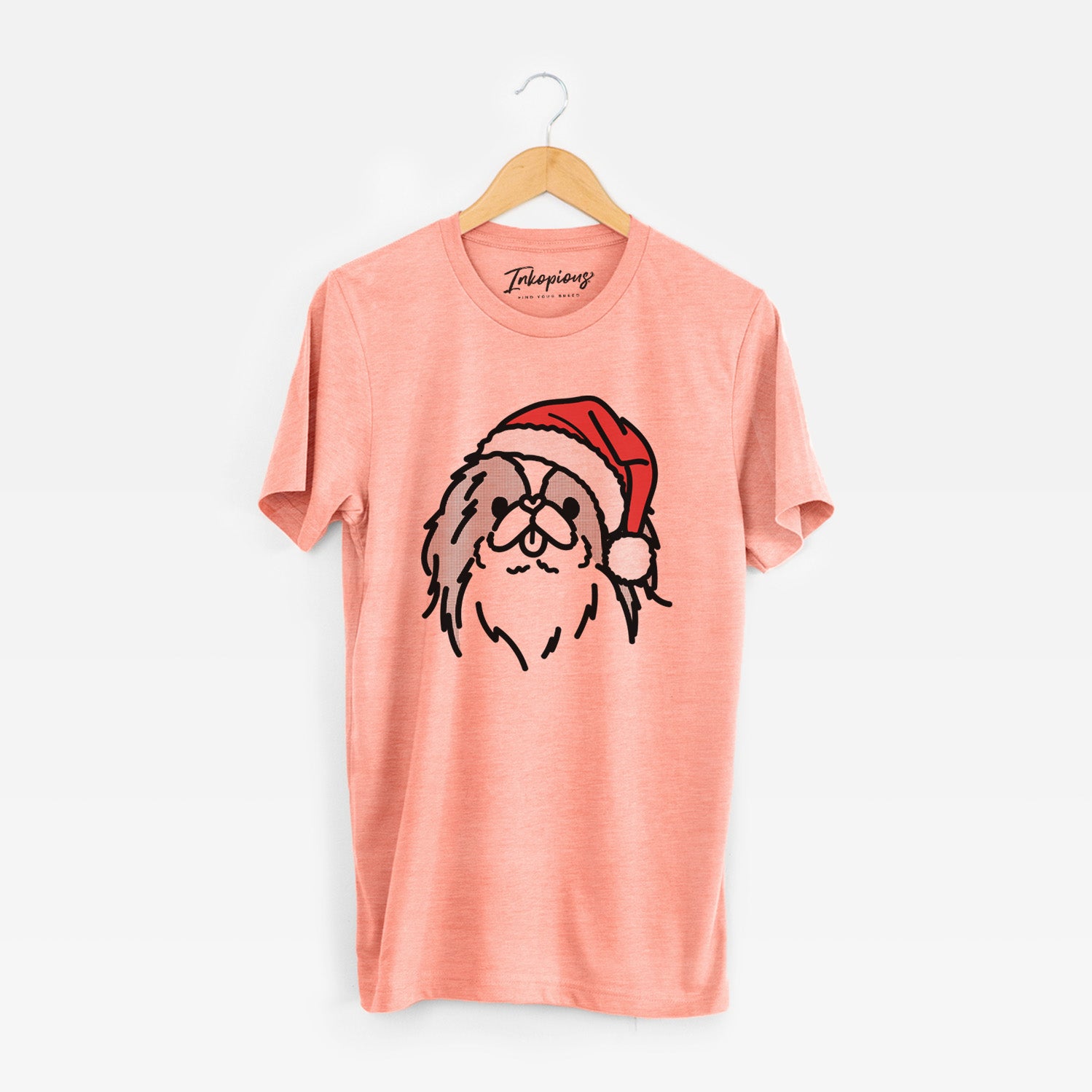 Minimalist line drawing of Macha the Japanese Chin wearing a Santa hat on a Sunset Unisex crewneck