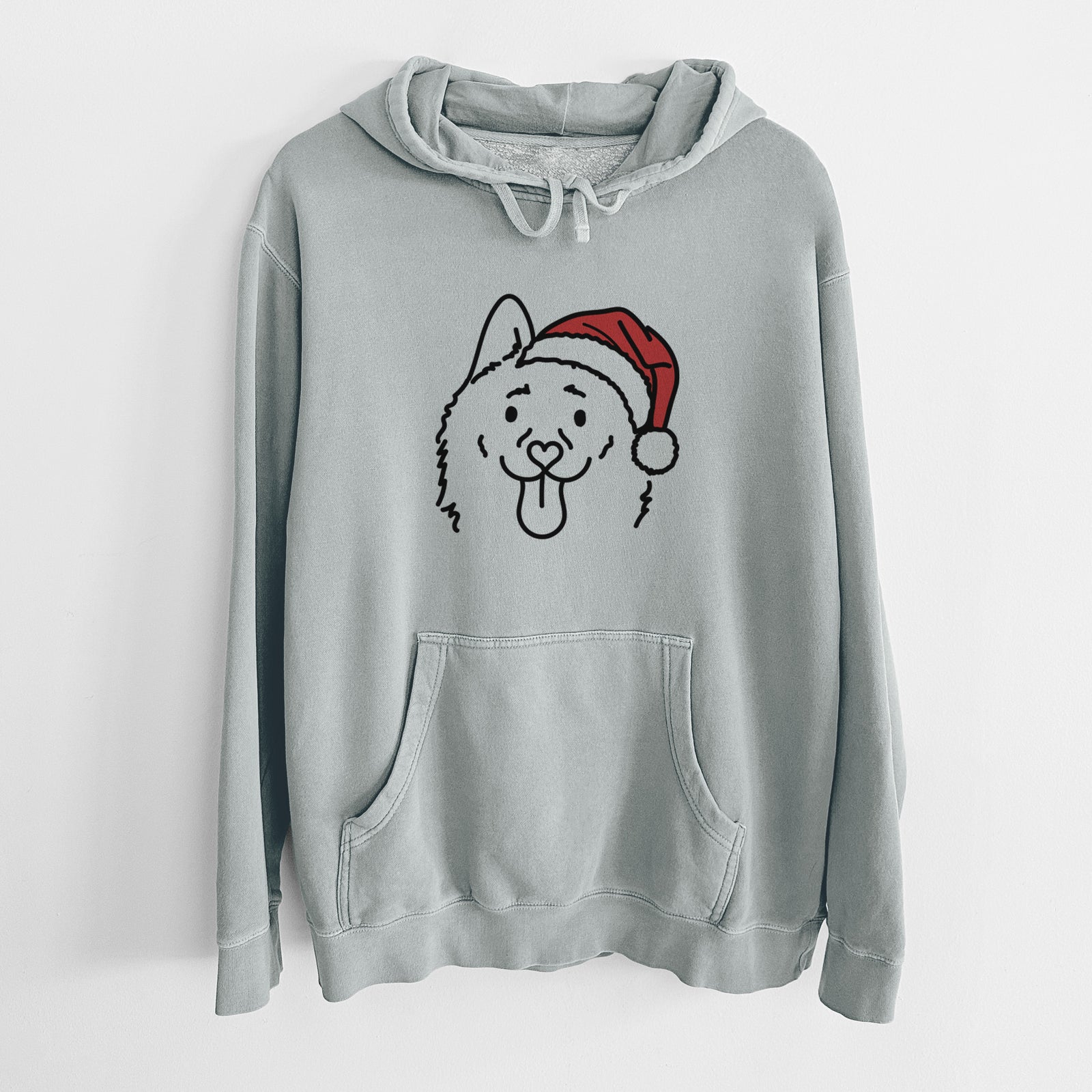 Minimalist line drawing of Meeko the Schipperke wearing a Santa hat on a Sage Unisex pigment dyed hoodie