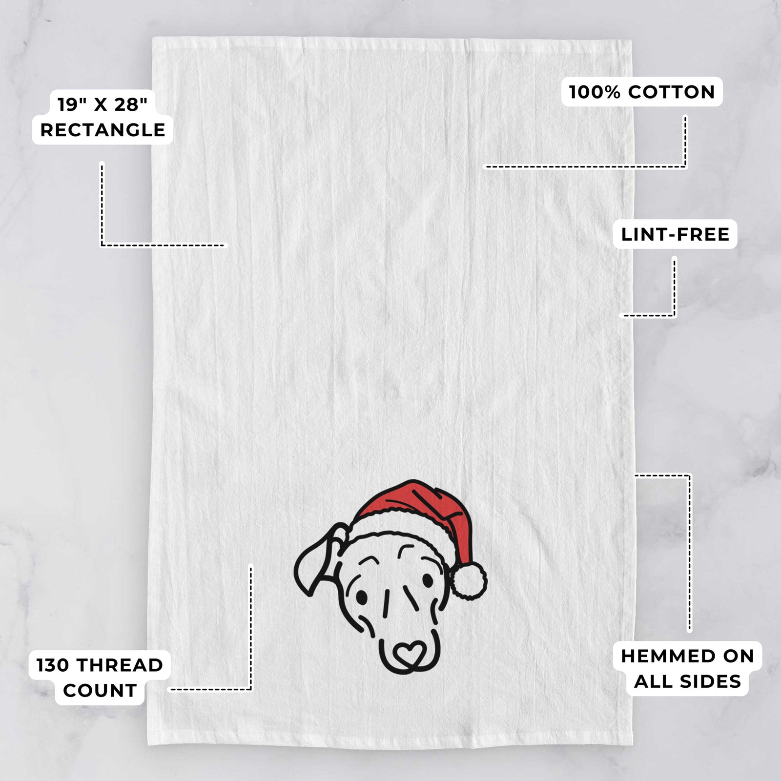 Minimalist line drawing of Millie the Mixed Breed wearing a Santa hat on a tea towel, with feature callouts: 19 x 28 inch rectangle, 100% cotton, lint-free, 120 thread count, hemmed on all sides