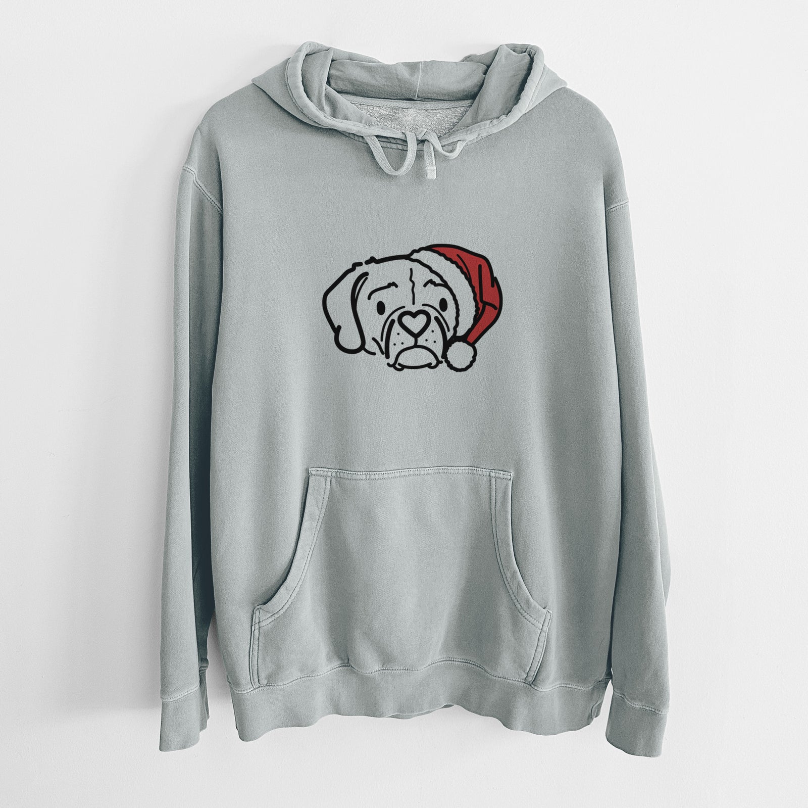 Minimalist line drawing of Mitzi the Puggle wearing a Santa hat on a Sage Unisex pigment dyed hoodie
