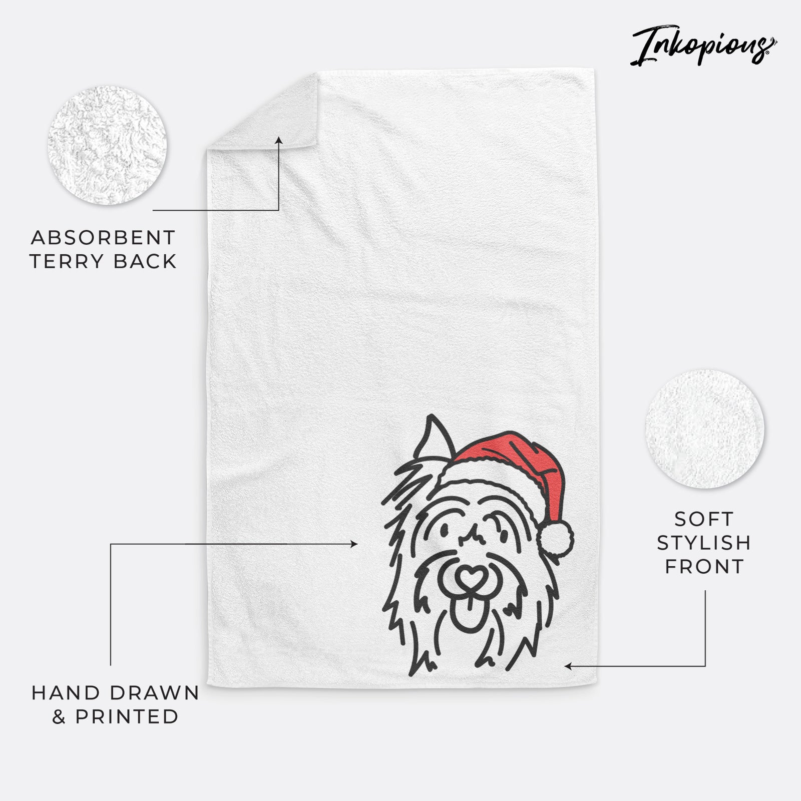 Minimalist line drawing of Monty the Silky Terrier wearing a Santa hat on a hand towel