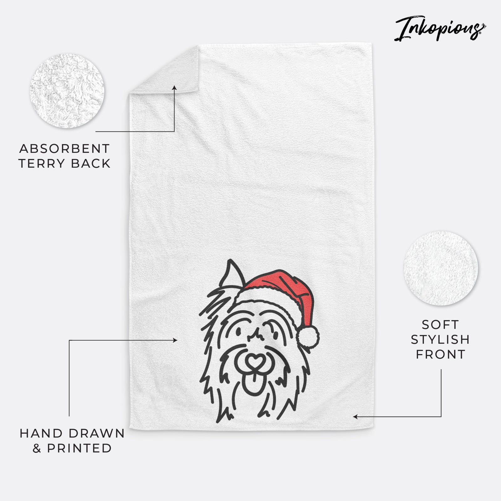 Minimalist line drawing of Monty the Silky Terrier wearing a Santa hat on a hand towel