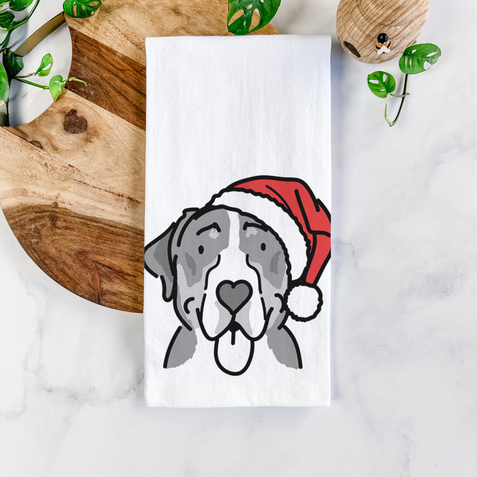 Minimalist line drawing of Moose the Greater Swiss Mountain Dog wearing a Santa hat on a tea towel