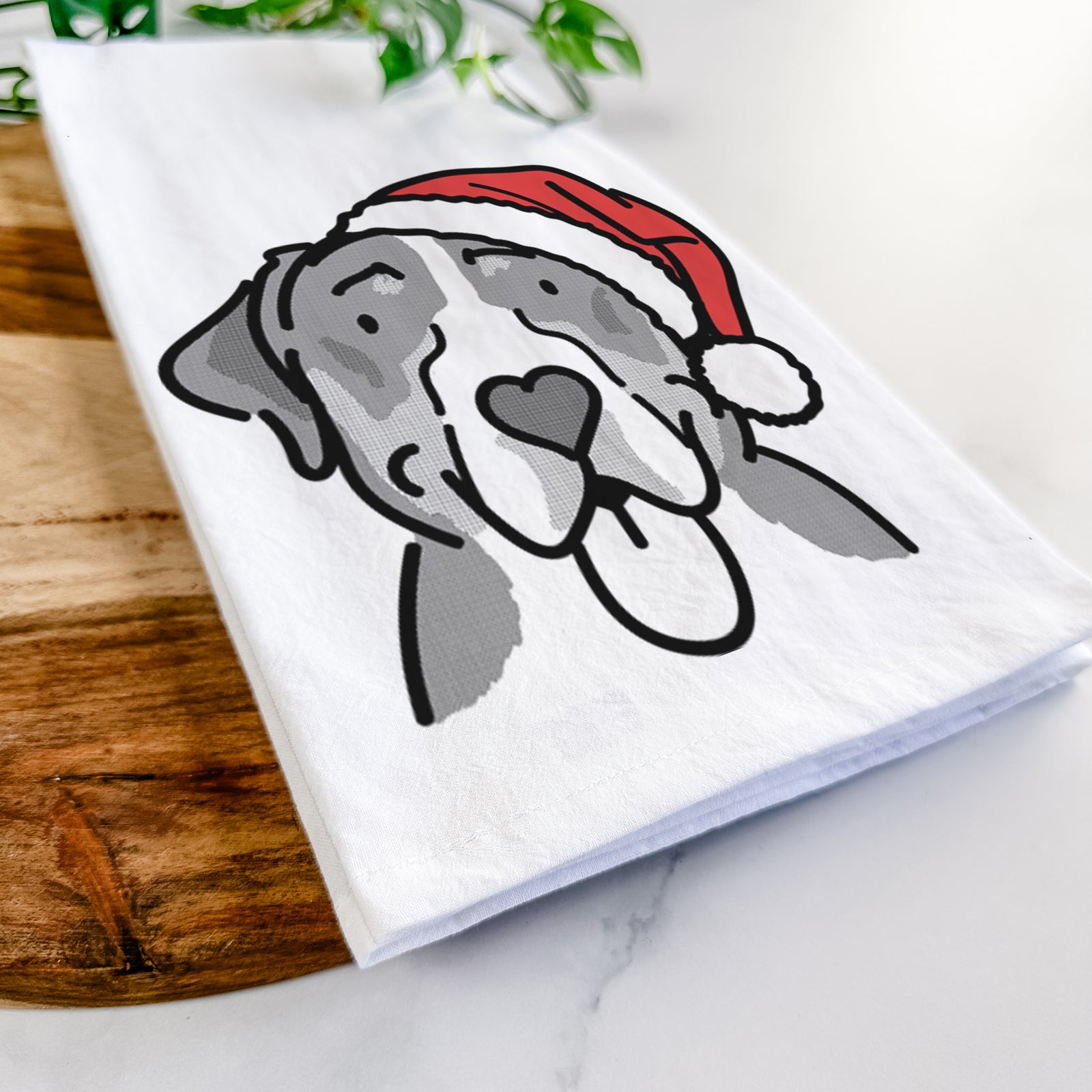Minimalist line drawing of Moose the Greater Swiss Mountain Dog wearing a Santa hat on a tea towel