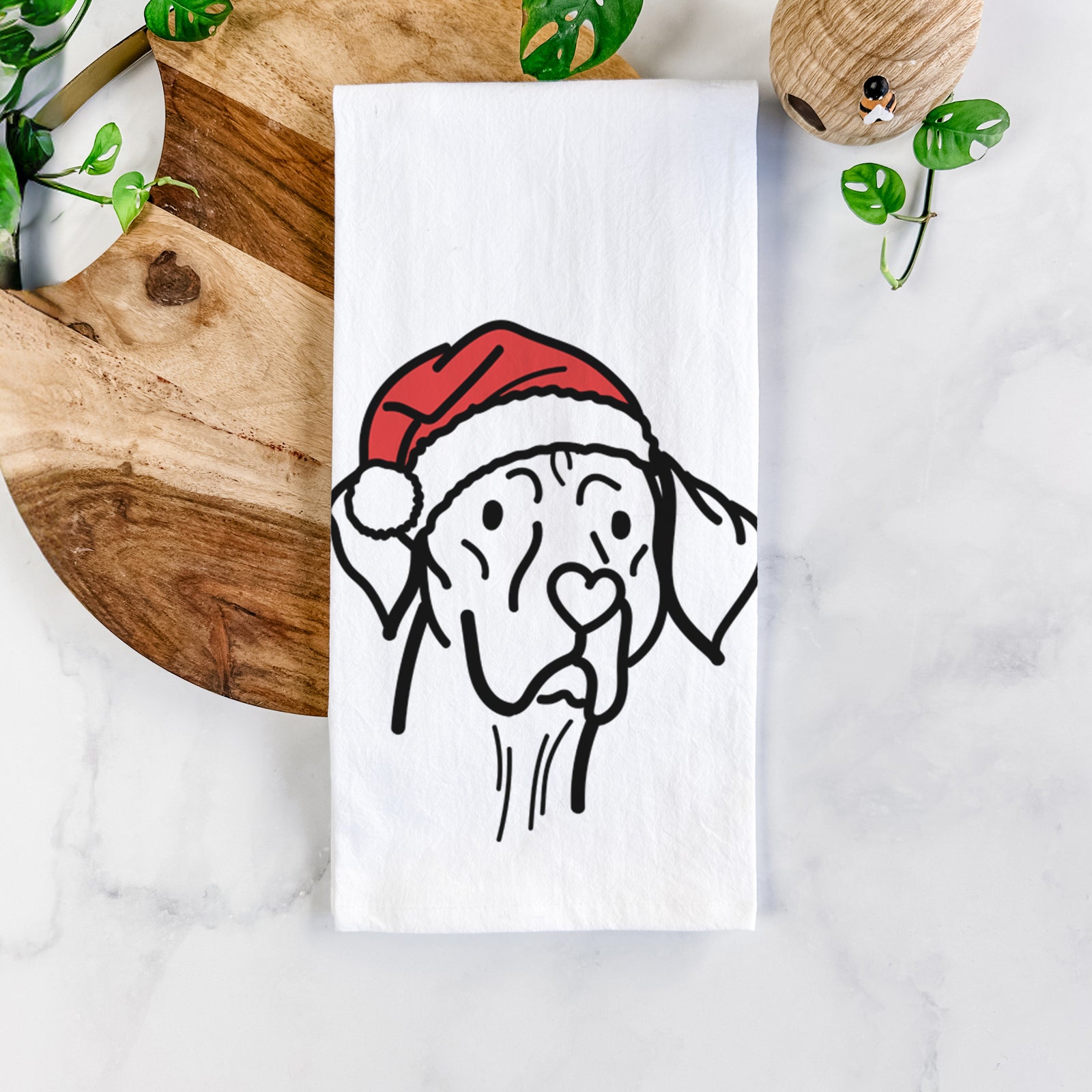 Minimalist line drawing of Moose the Vizsla wearing a Santa hat on a tea towel