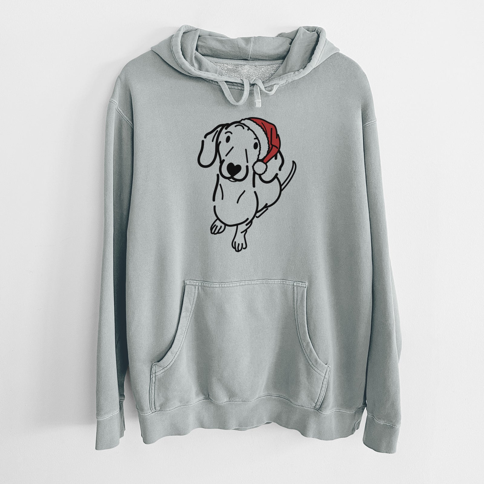Minimalist line drawing of Moxie the Dachshund wearing a Santa hat on a Sage Unisex pigment dyed hoodie