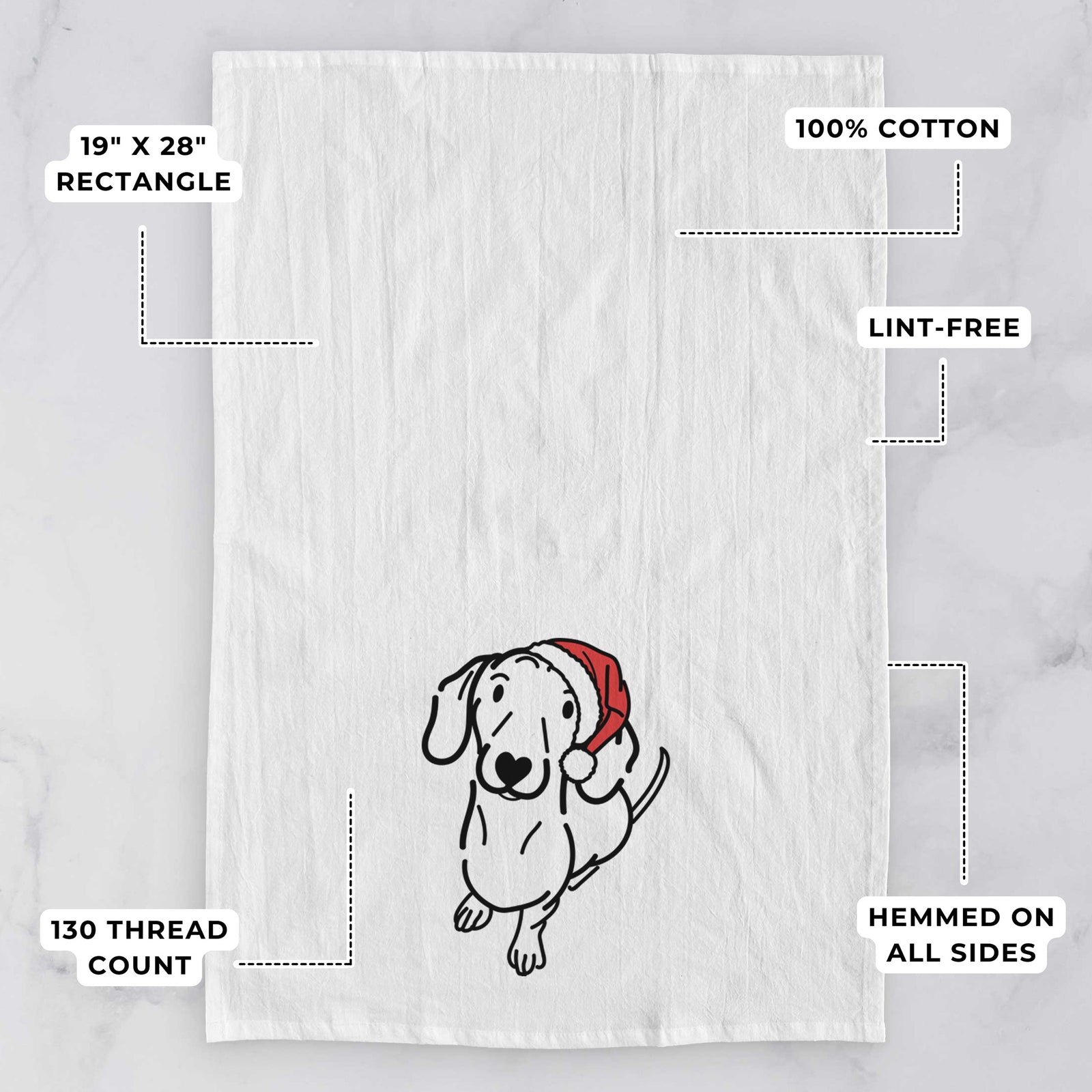 Minimalist line drawing of Moxie the Dachshund wearing a Santa hat on a tea towel, with feature callouts: 19 x 28 inch rectangle, 100% cotton, lint-free, 120 thread count, hemmed on all sides