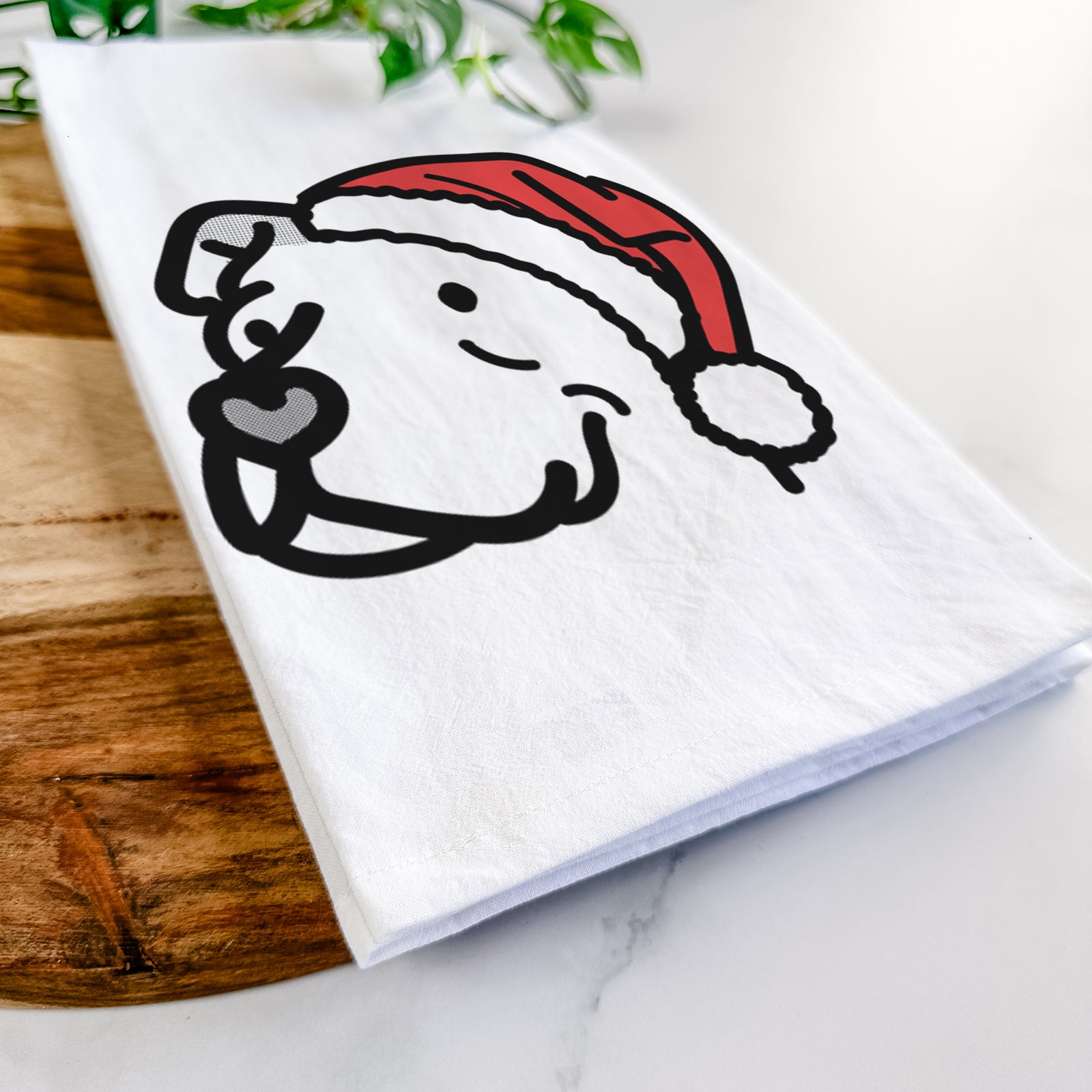Minimalist line drawing of Mr. Sir the Pitbull Mix wearing a Santa hat on a tea towel