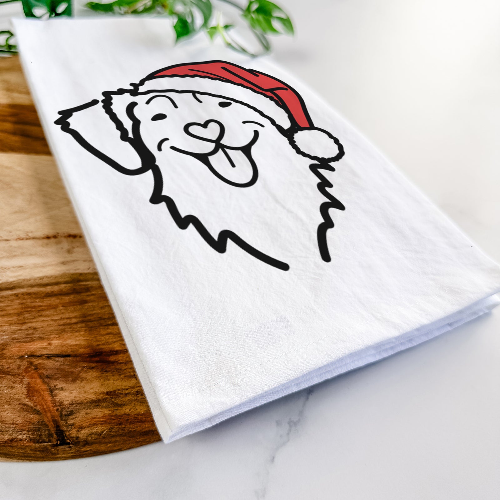 Minimalist line drawing of a Nova Scotia Duck Tolling Retriever wearing a Santa hat on a tea towel