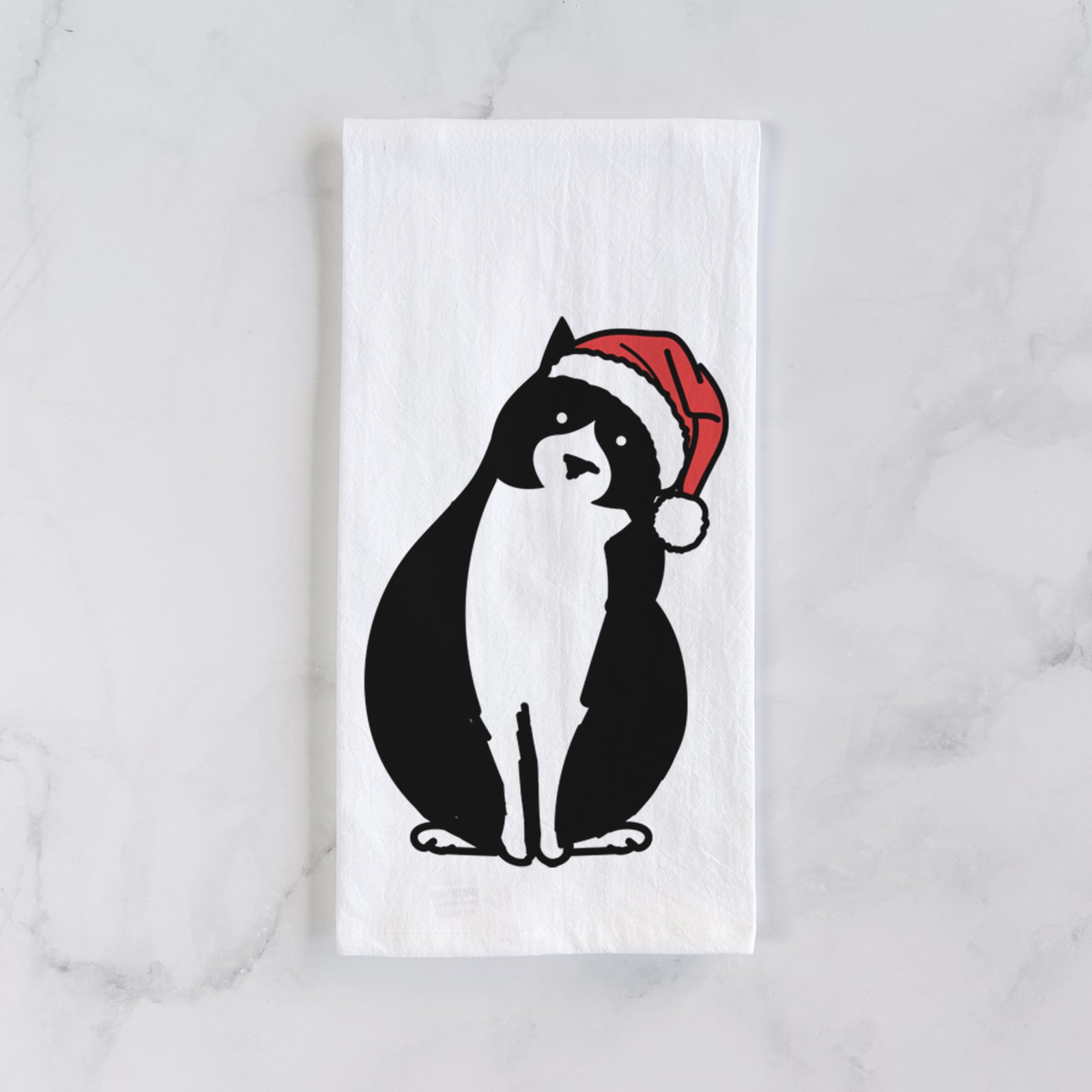 Minimalist line drawing of Oliver the Tuxedo Cat wearing a Santa hat on a tea towel