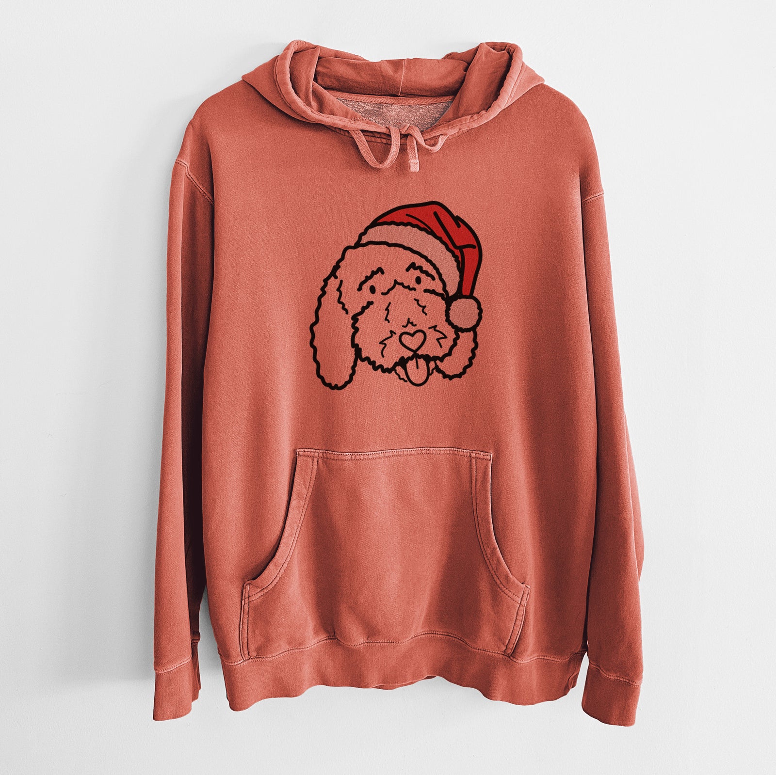 Minimalist line drawing of Ruby the Bernedoodle wearing a Santa hat on an Amber Unisex pigment dyed hoodie