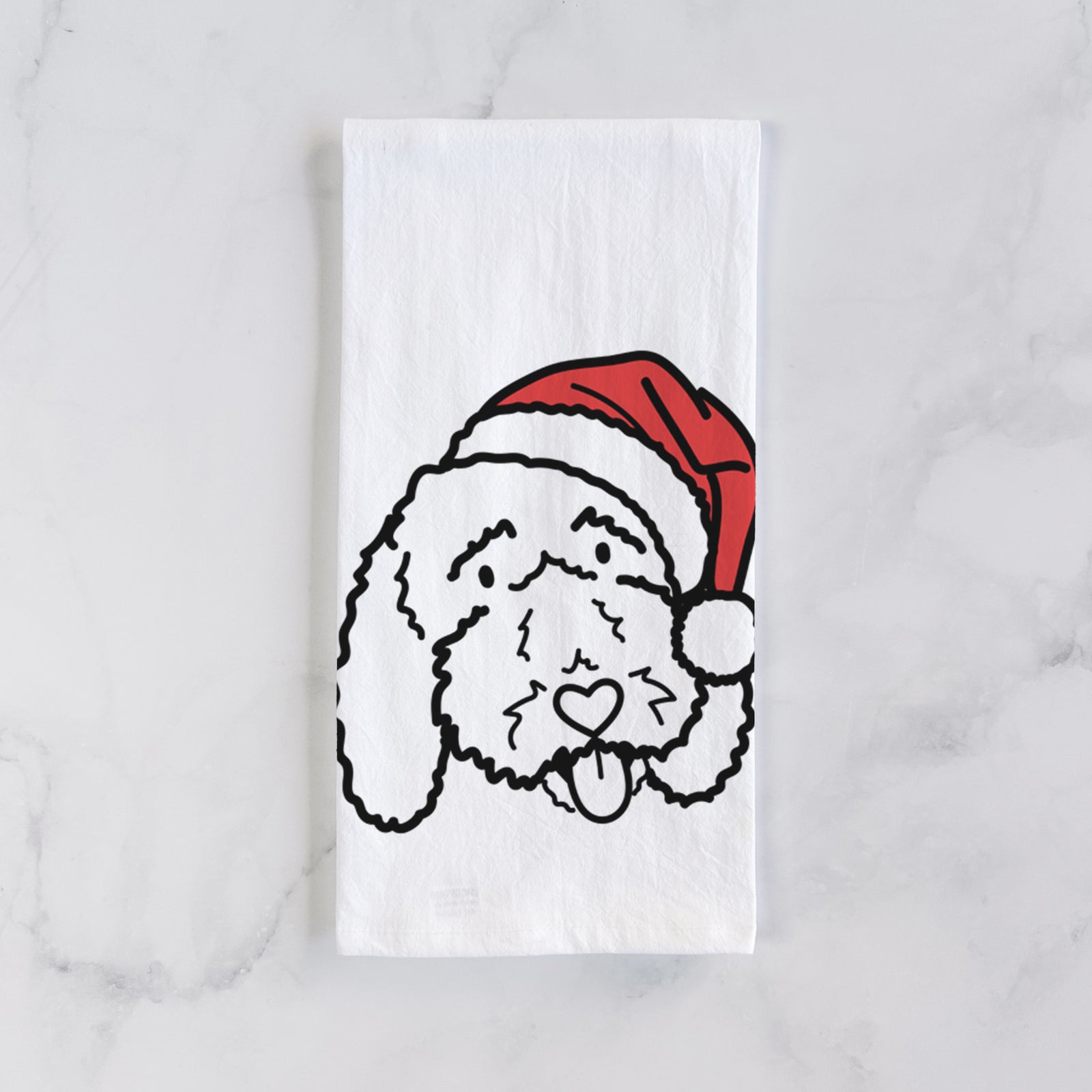 Minimalist line drawing of Ruby the Bernedoodle wearing a Santa hat on a tea towel