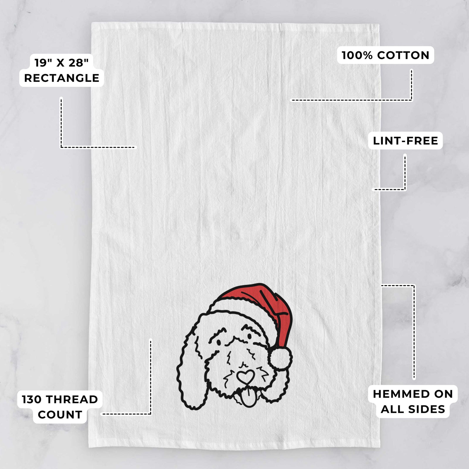 Minimalist line drawing of Ruby the Bernedoodle wearing a Santa hat on a tea towel, with feature callouts: 19 x 28 inch rectangle, 100% cotton, lint-free, 120 thread count, hemmed on all sides