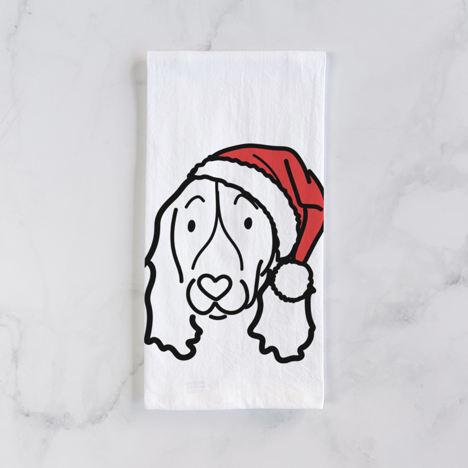 Minimalist line drawing of an English Springer Spaniel wearing a Santa hat on a tea towel