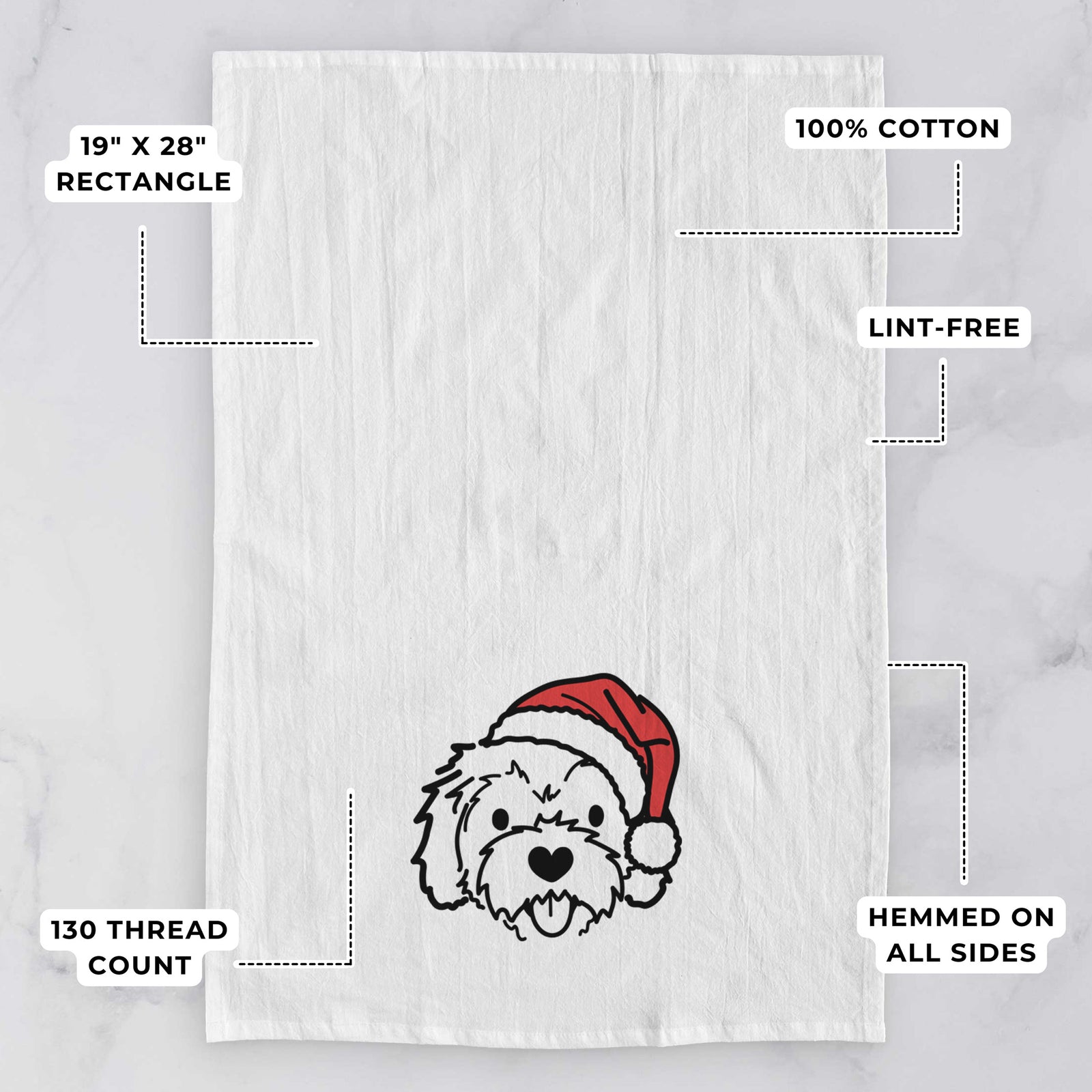 Minimalist line drawing of Sprinkles the Cockapoo wearing a Santa hat on a tea towel, with feature callouts: 19 x 28 inch rectangle, 100% cotton, lint-free, 120 thread count, hemmed on all sides