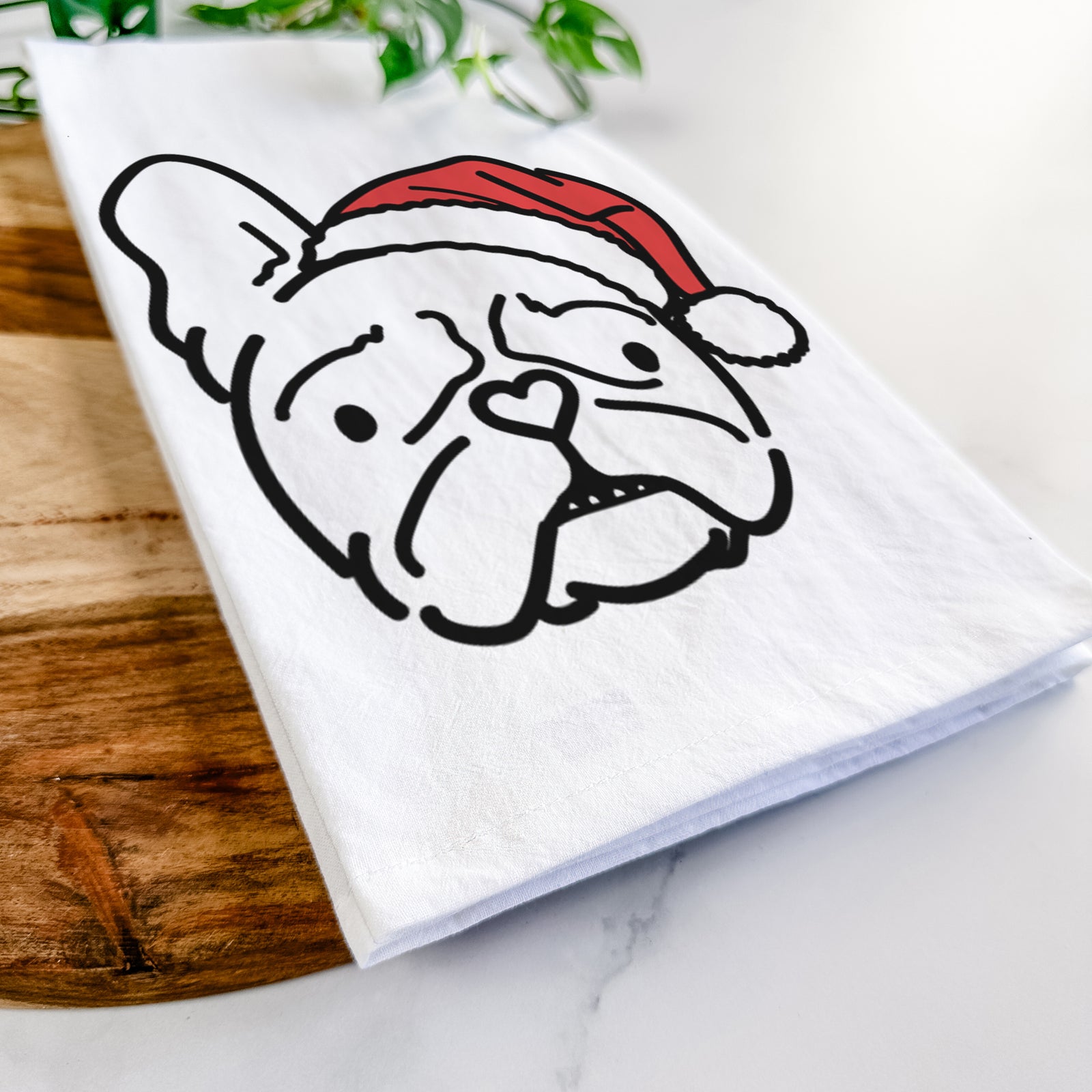 Minimalist line drawing of Squishy the French Bulldog wearing a Santa hat on a tea towel