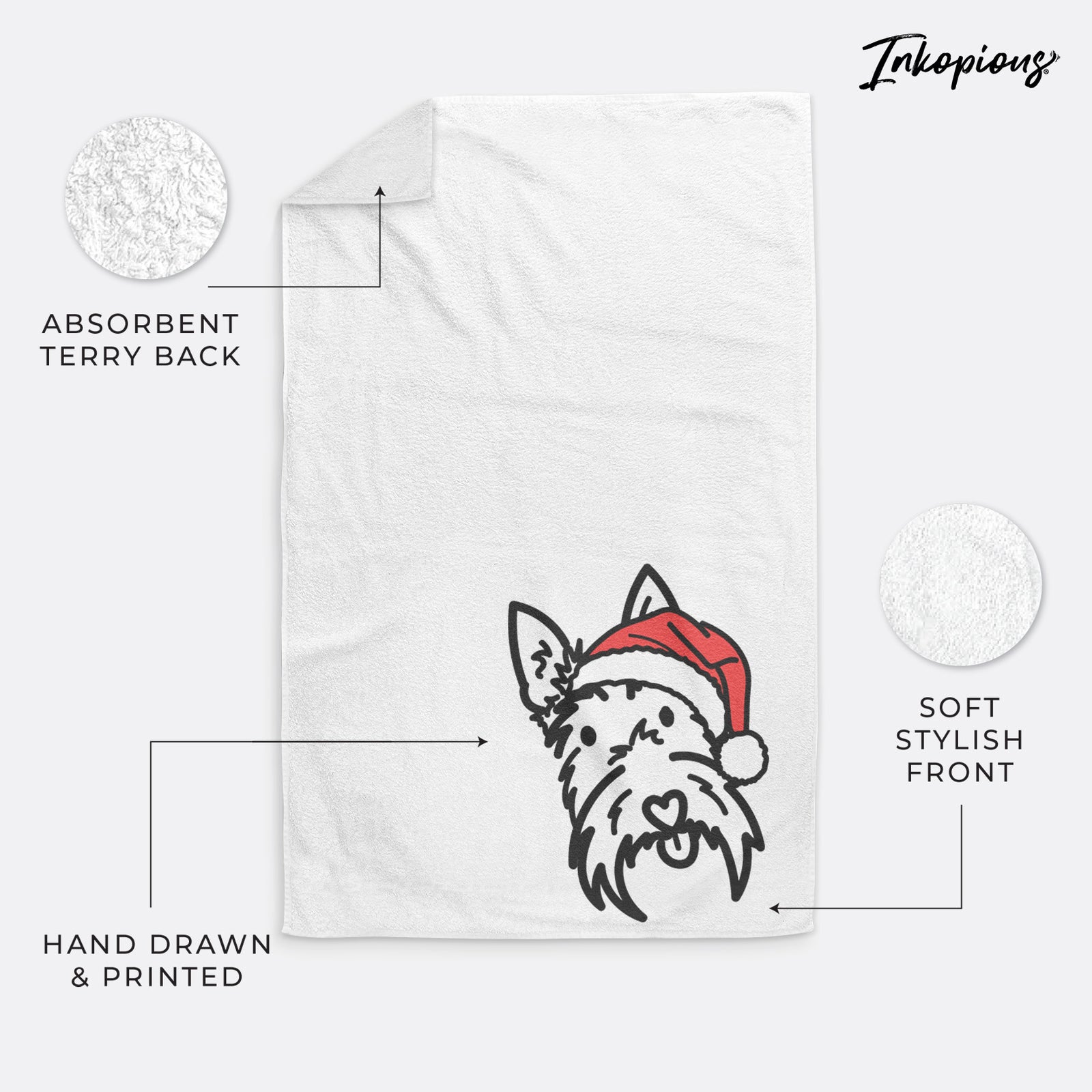 Minimalist line drawing of Thistle the Scottish Terrier wearing a Santa hat on a decorative hand towel