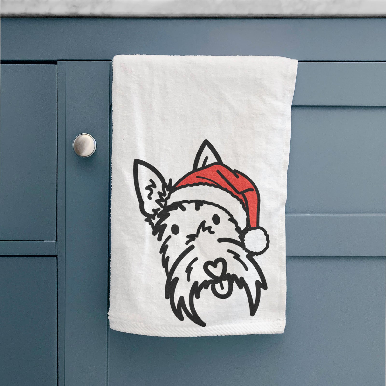 Minimalist line drawing of Thistle the Scottish Terrier wearing a Santa hat on a decorative hand towel
