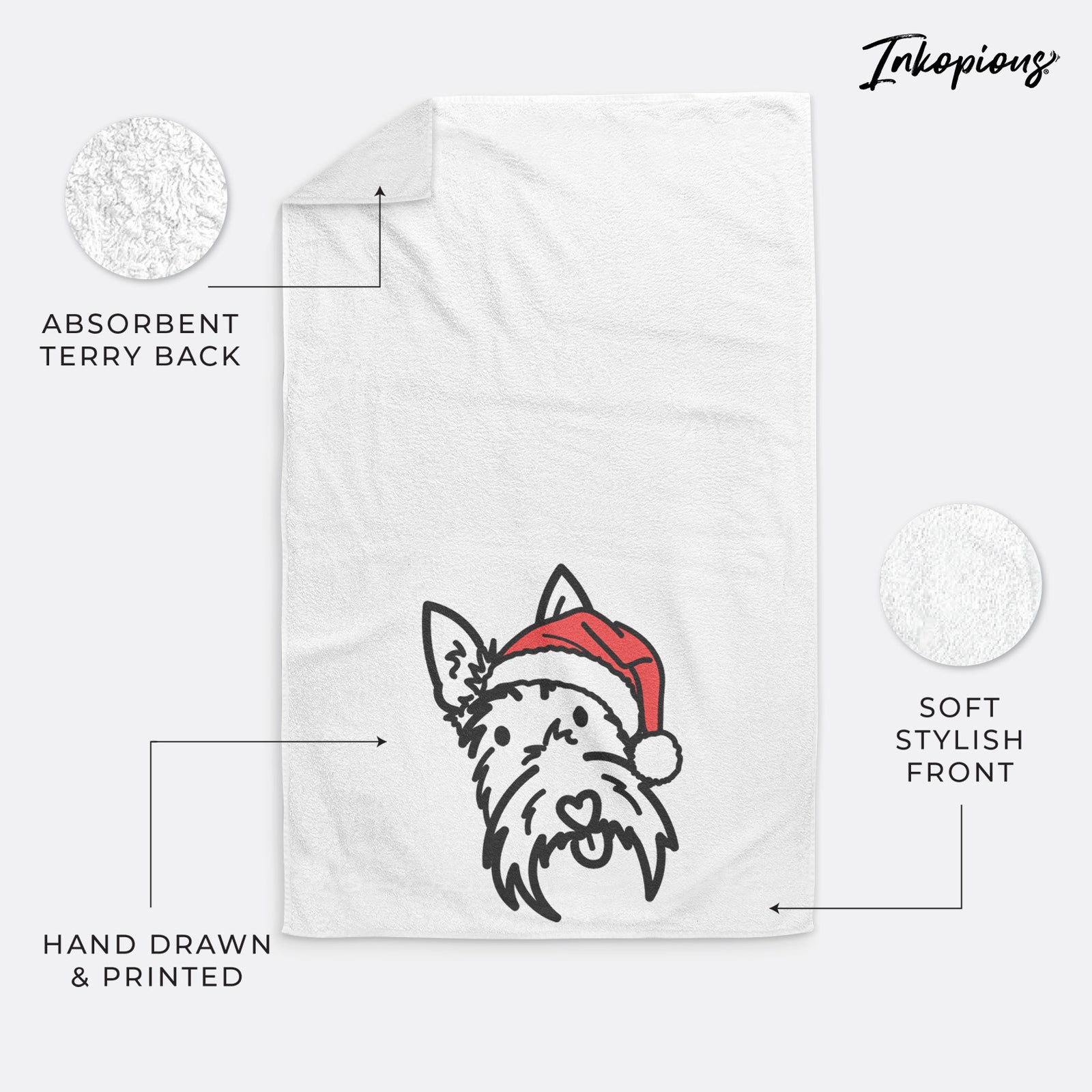 Minimalist line drawing of Thistle the Scottish Terrier wearing a Santa hat on a decorative hand towel