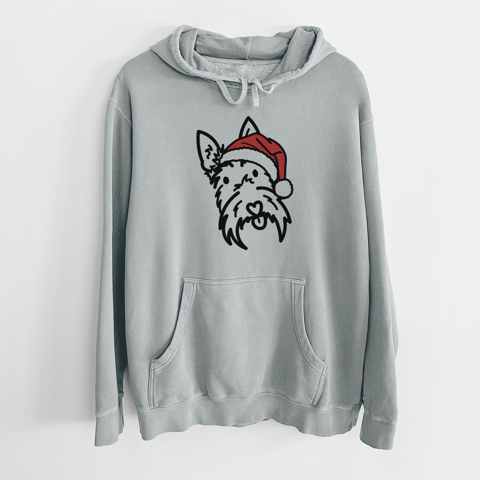 Minimalist line drawing of Thistle the Scottish Terrier wearing a Santa hat on a Sage Unisex pigment dyed hoodie