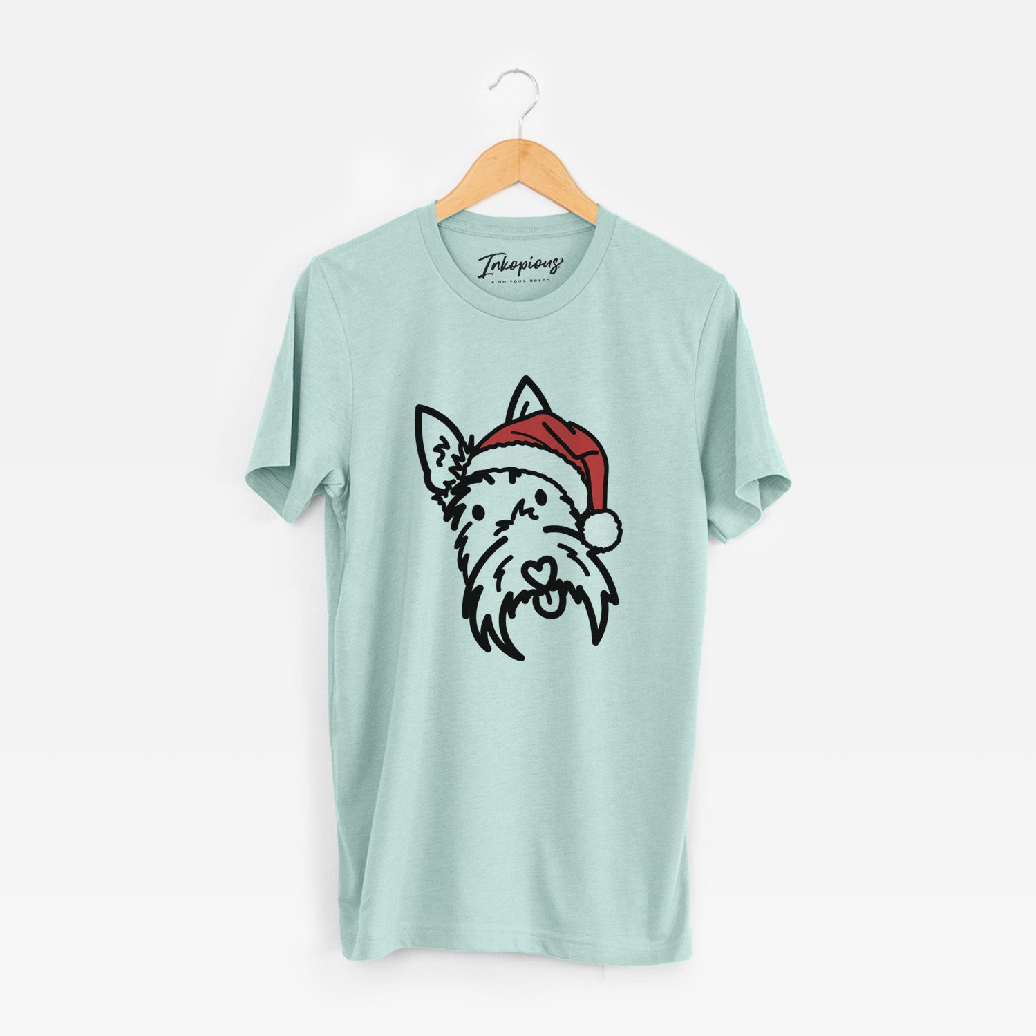 Minimalist line drawing of Thistle the Scottish Terrier wearing a Santa hat on a Heather Sage Unisex crewneck