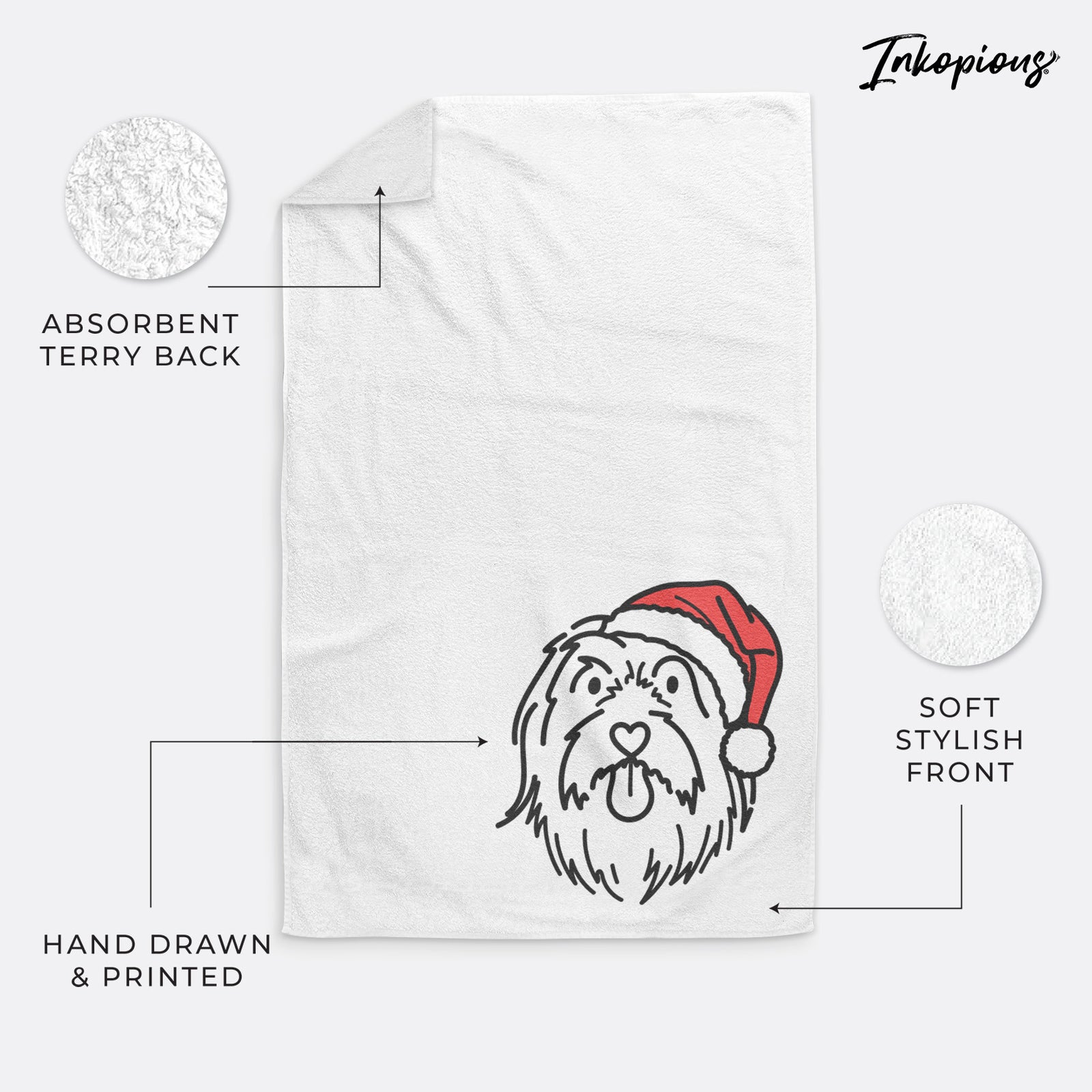 Minimalist line drawing of Tucker the Bearded Collie wearing a Santa hat on a decorative hand towel