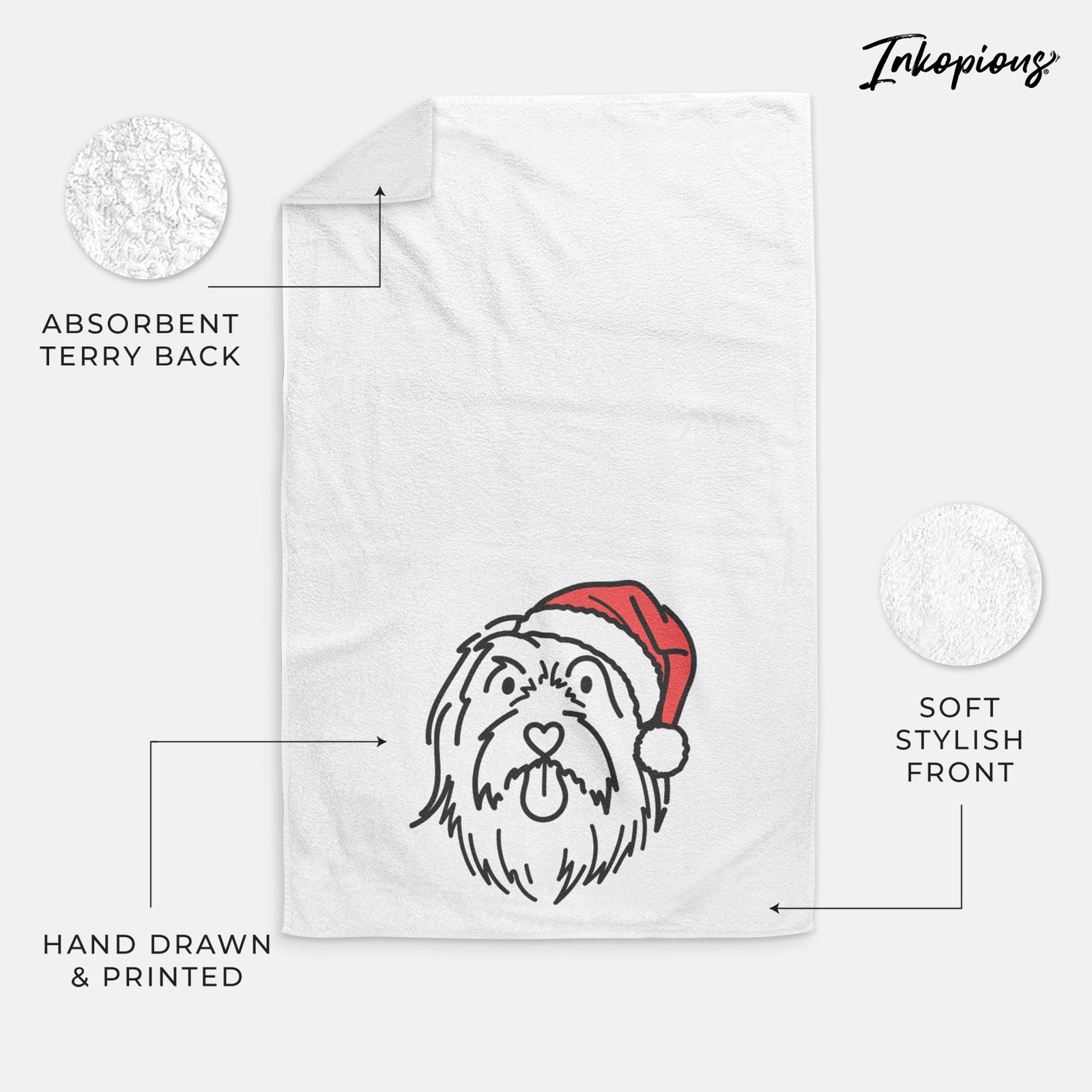 Minimalist line drawing of Tucker the Bearded Collie wearing a Santa hat on a decorative hand towel
